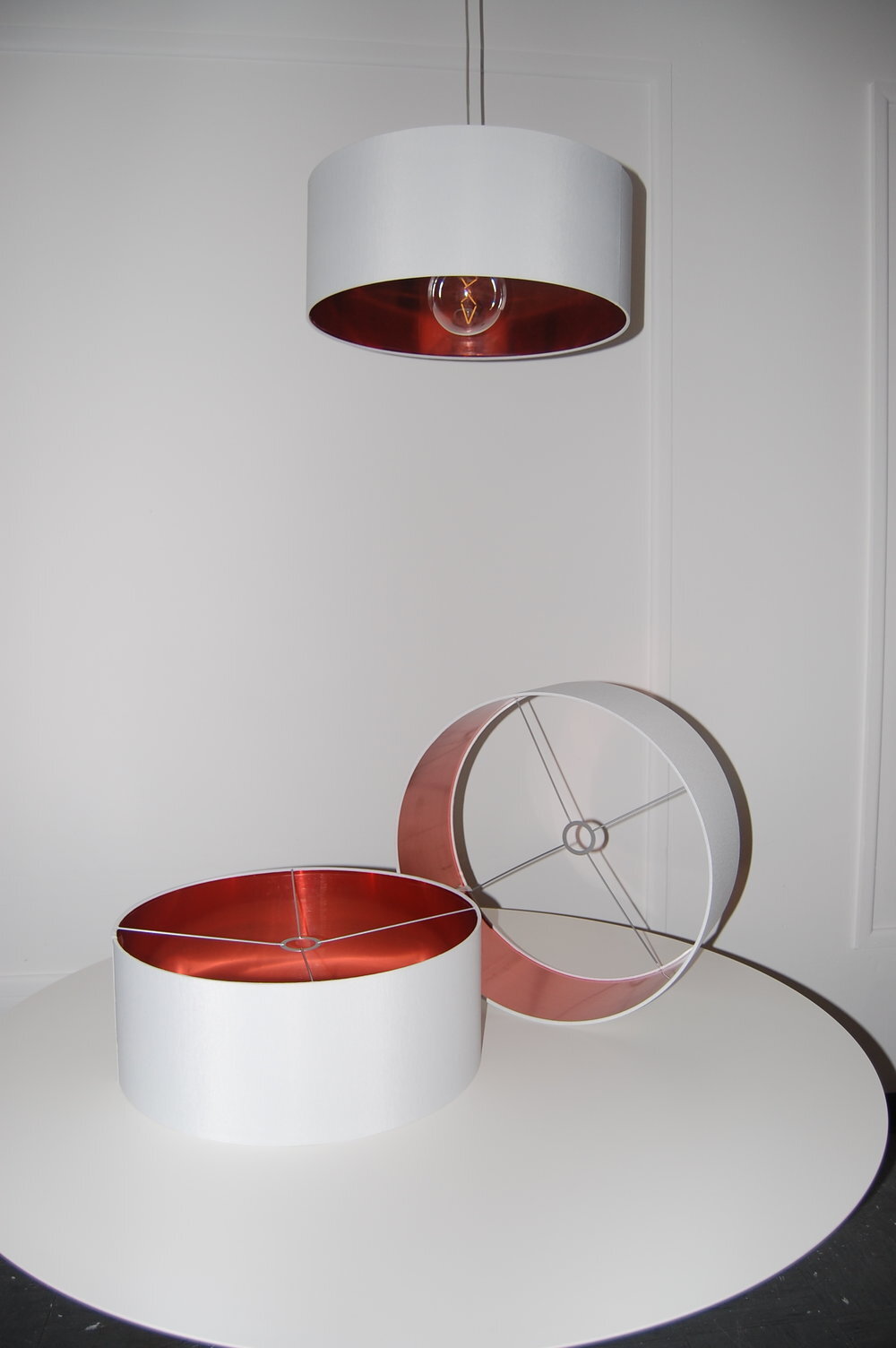 White and copper pendant drum lampshades