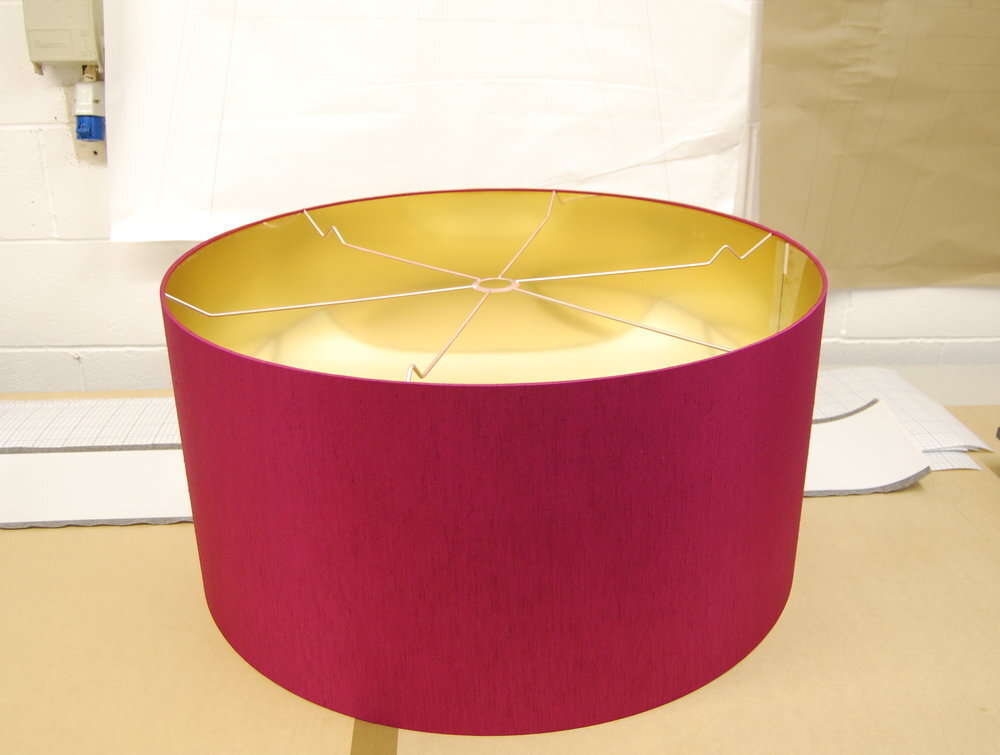 large pink pendant lamp shade with shiny gold lining