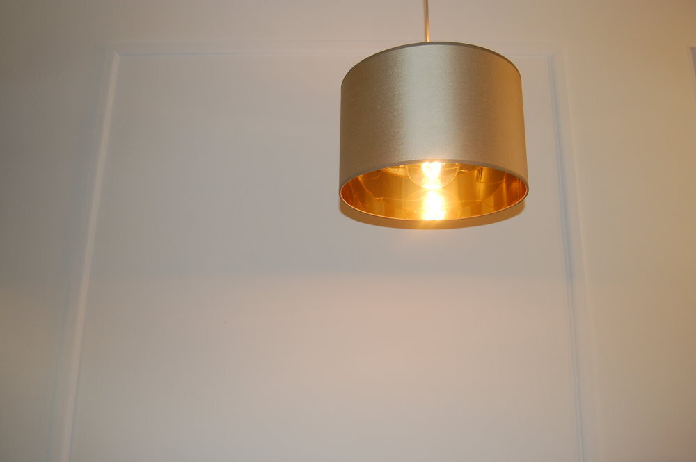 Luxury handmade silk lampshades with complementary metallic linings 