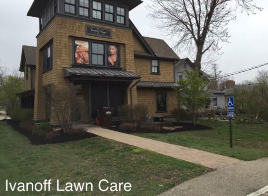 Salon front yard with sidewalk from complete lawn maintenance package from Ivanoff.