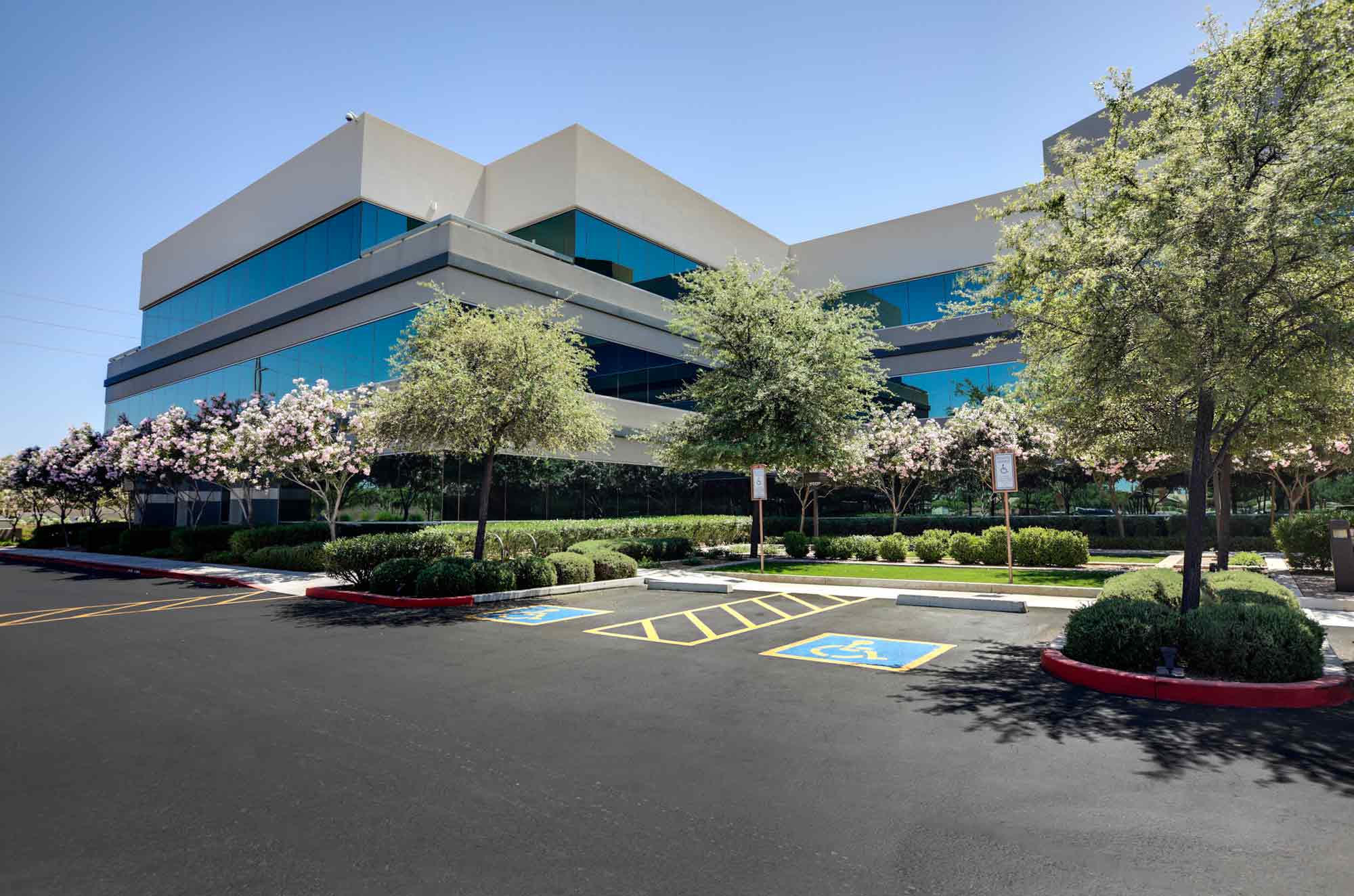 Commercial landscape front parking lot, landscaping services by Ivanoff Lawn Care and Landscaping