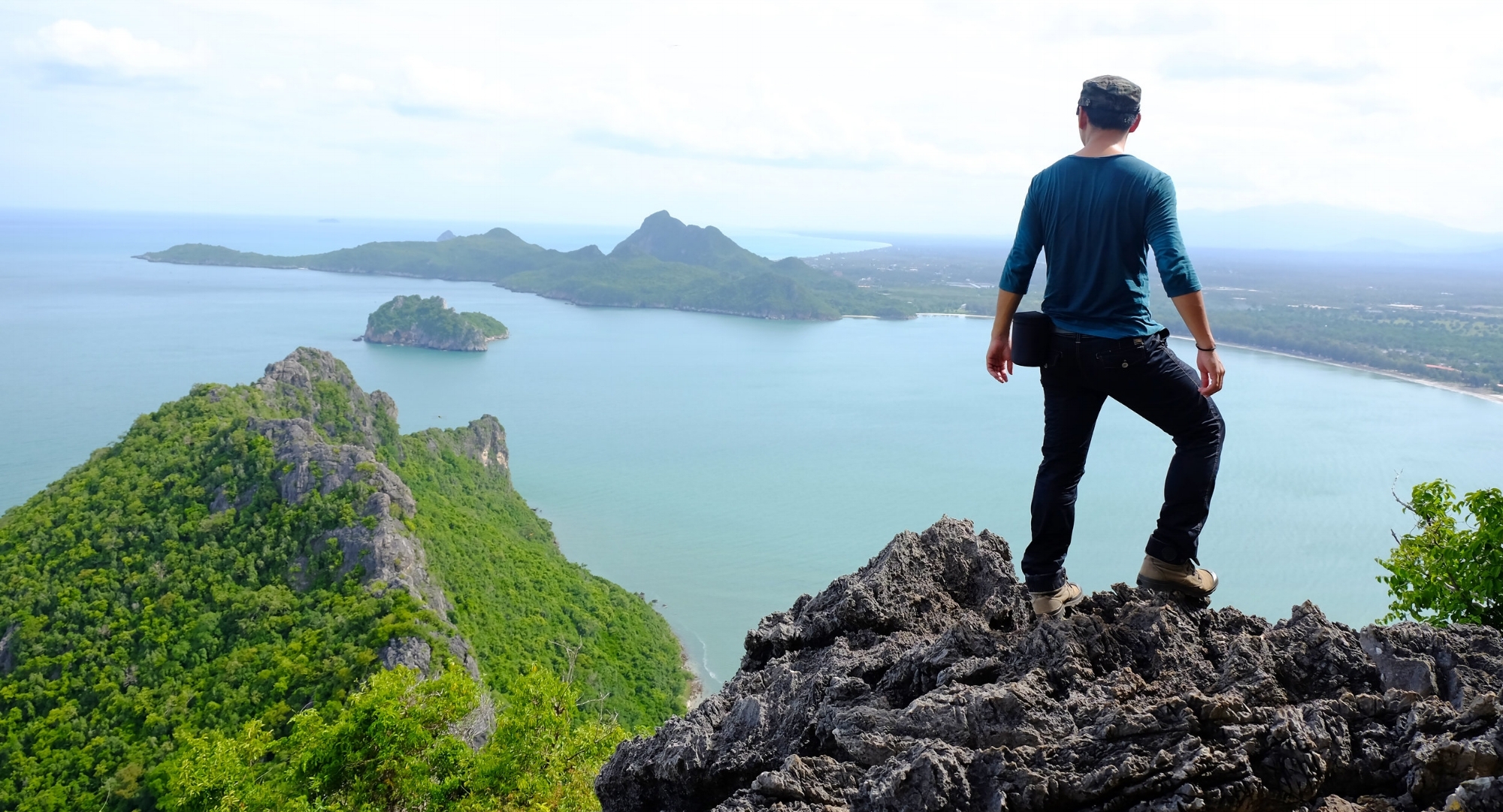 AdobeStock_Climber overlooking ocean.jpeg