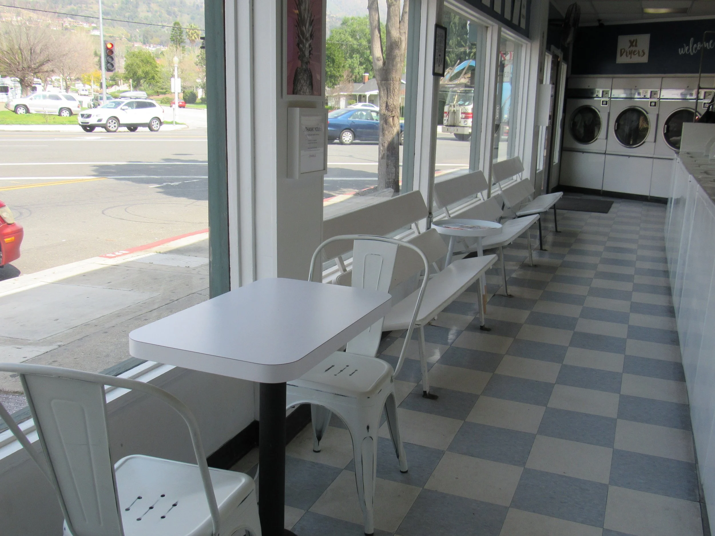 TABLES, CHAIRS, BENCHES & BARSTOOLS - WHETHER YOU PREFER TO LOUNGE ON A BENCH & WATCH TV OR PLOP YOUR LAPTOP ON A TABLE & SOAK IN STREET & MOUNTAIN VIEWS, we'VE GOT YOU COVERED!