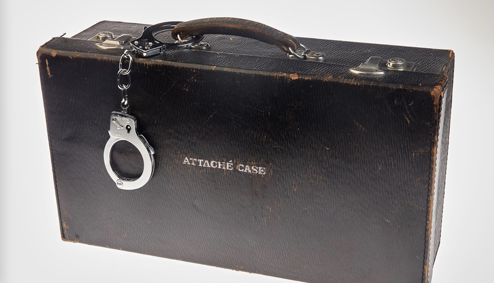 THIS BRIEFCASE HOLDS TINY ART WITH BIG MEANING — Peter Burke