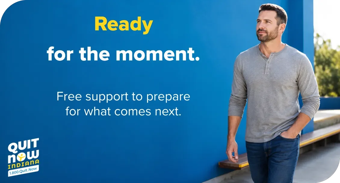 A man walking outdoors beside a blue background. Text reads: "Ready for the moment. Free support to prepare for what comes next." Quit Now Indiana logo and 1-800-QUIT-NOW appear at the bottom.