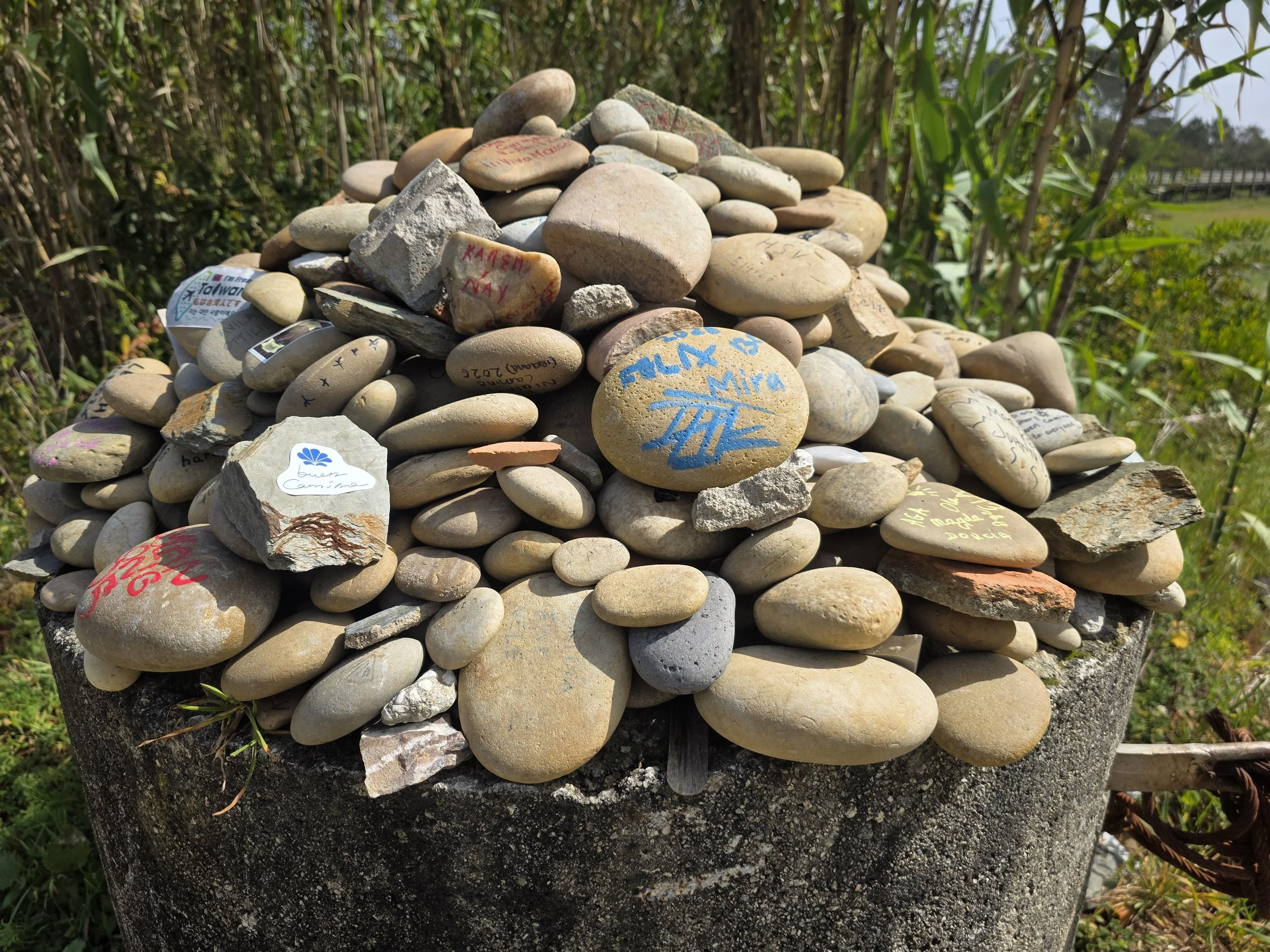 Pilgirms leave inscribed rocks to symbolize burdens relased or prayers offered as the walk toward Santiago.
