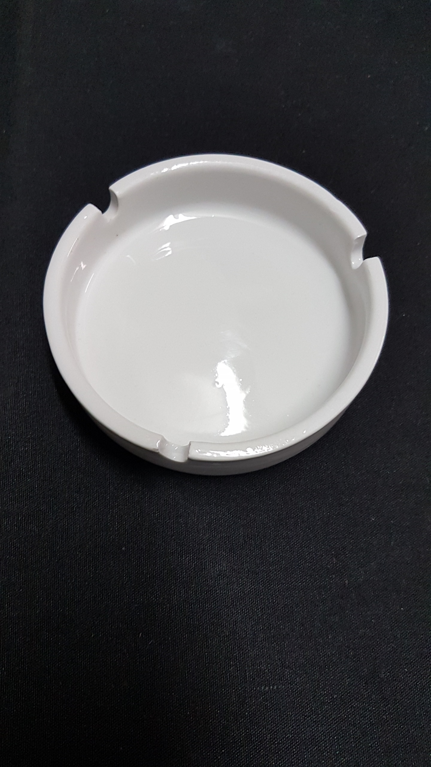 White China Ashtray $1.00ea