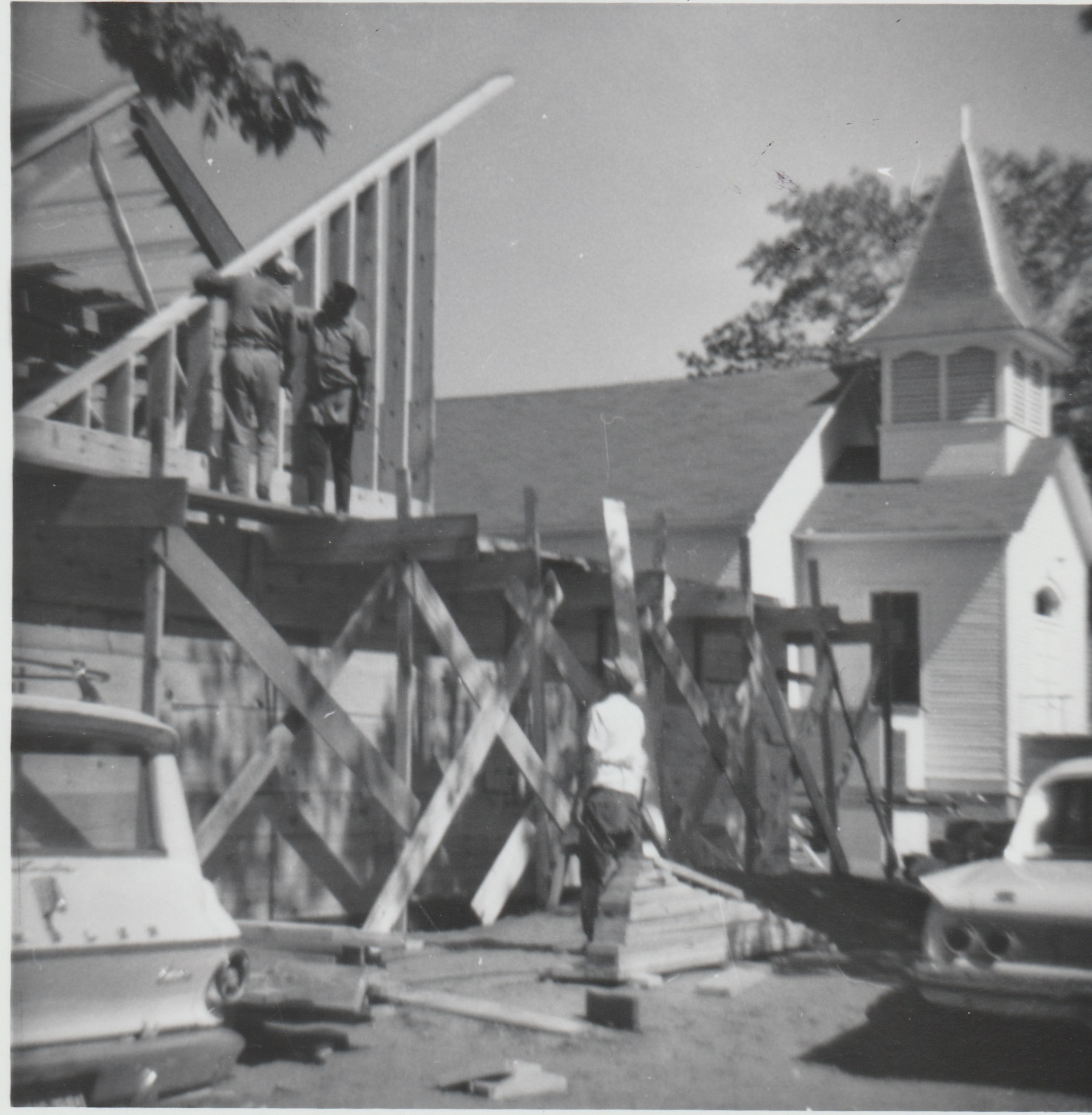 New Church going up with Old building in background.jpeg