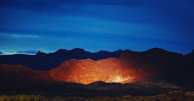 Around a curve in the road, there it was. The last glow of light catching a rock wall and making it glow.