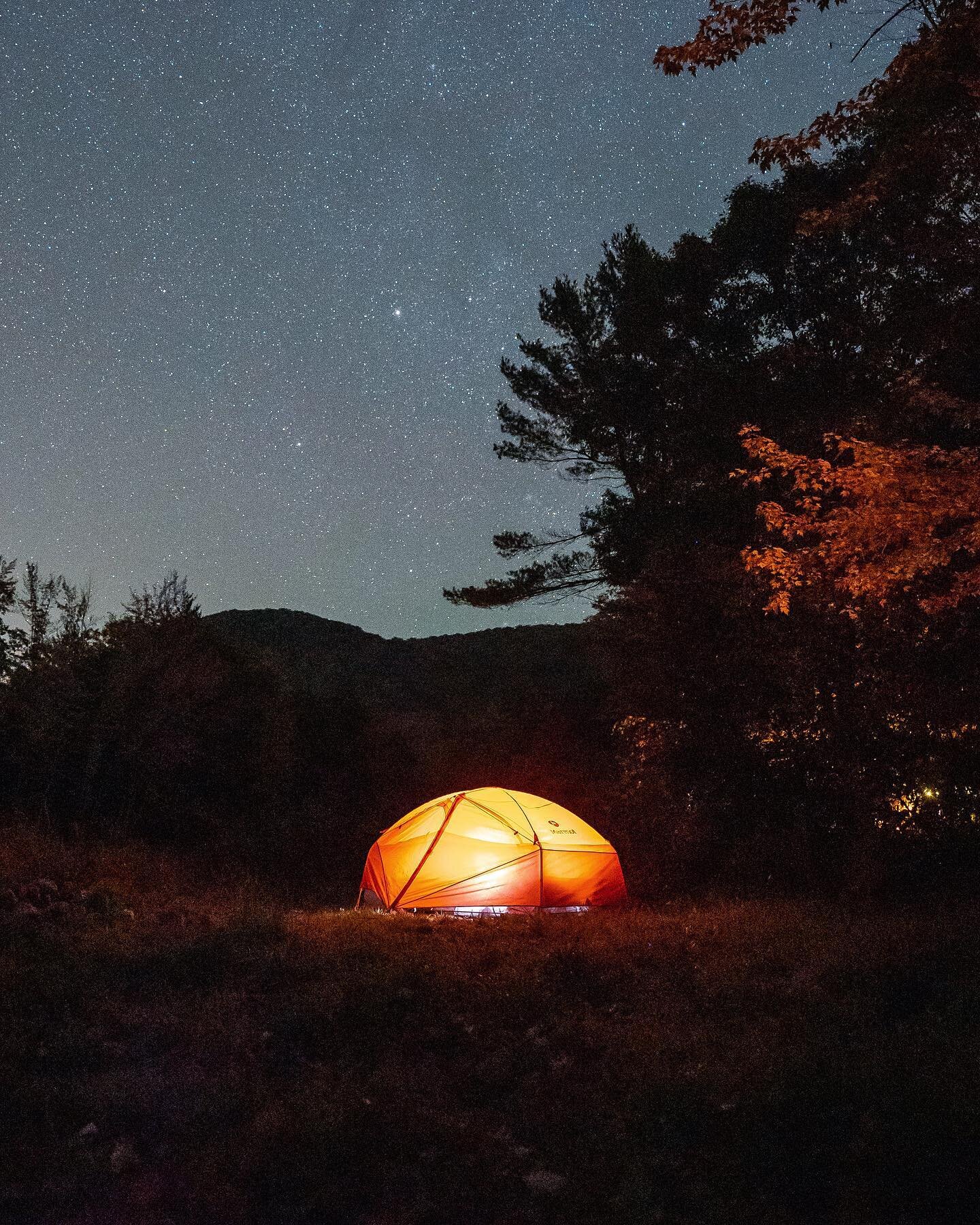 Riverside camping under the stars. Happy how this shot turned out after improvising a forgotten tripod with a stack of firewood! #Hipcamp #Adirondacks