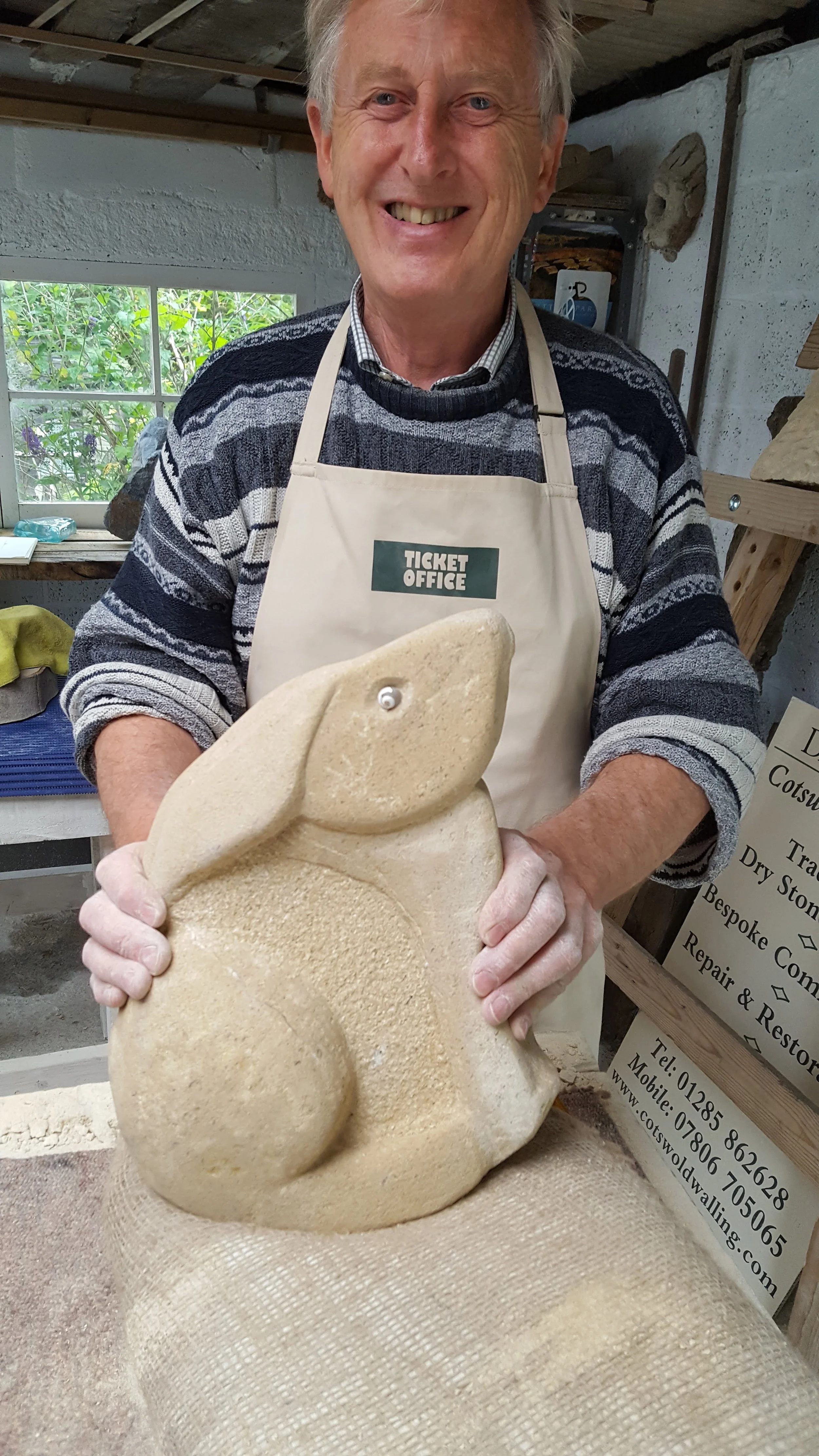First time carver Peter showing off his stone hare