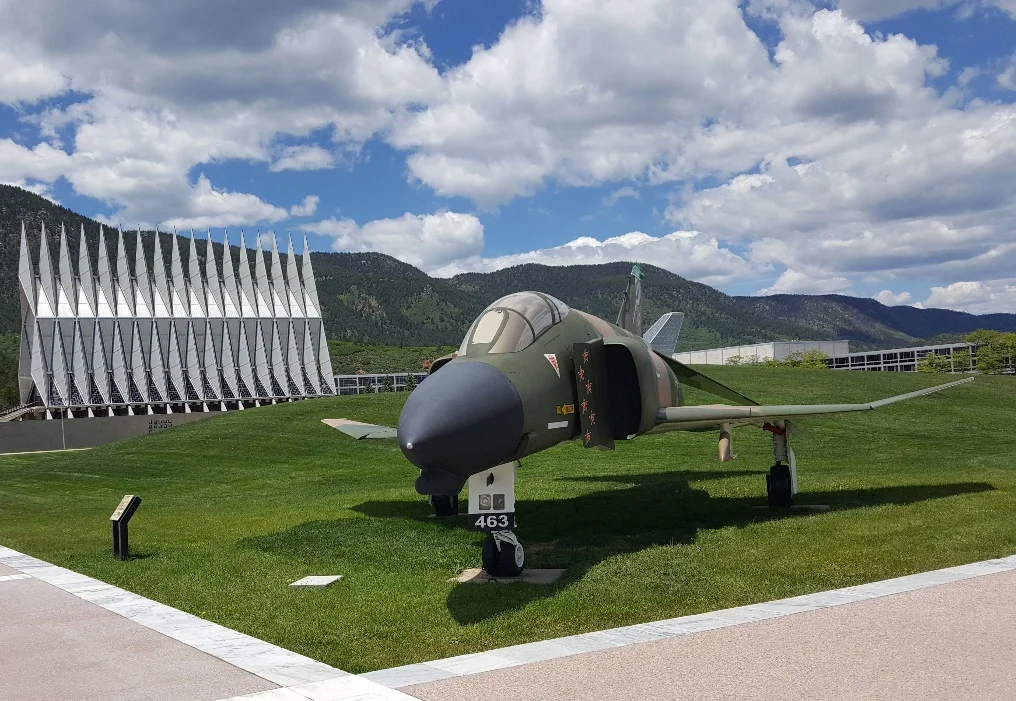 An F4 Phantom with the Air Force Academy Chapel in the background
