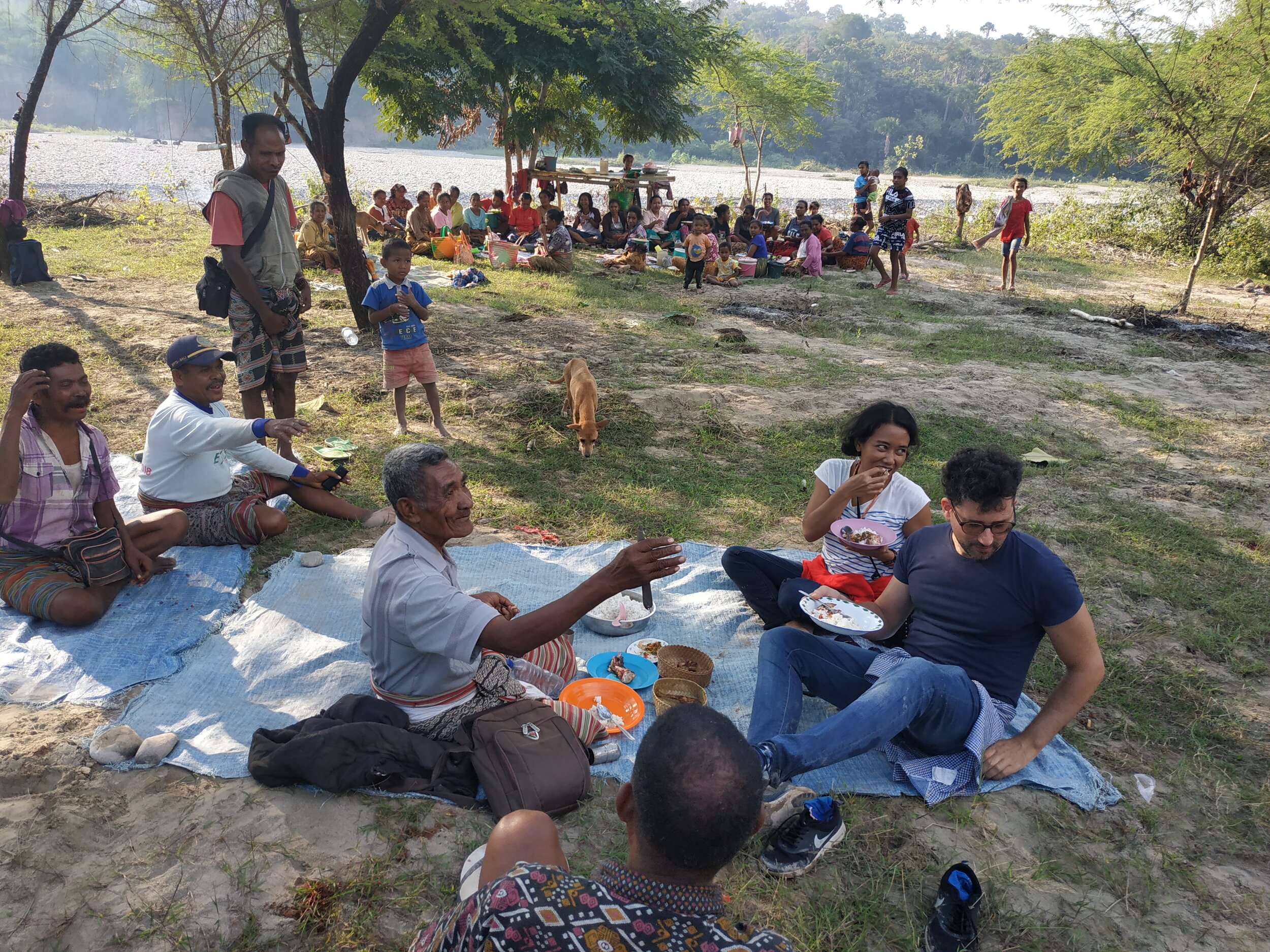  A feast was held by a community in a village in East Amanuban in Timor Island, Indonesia, after they had a ritual sacrifice for a new canal. The ritual was lead by a fukun, an elderly who was believed to have power to control water in the village. I