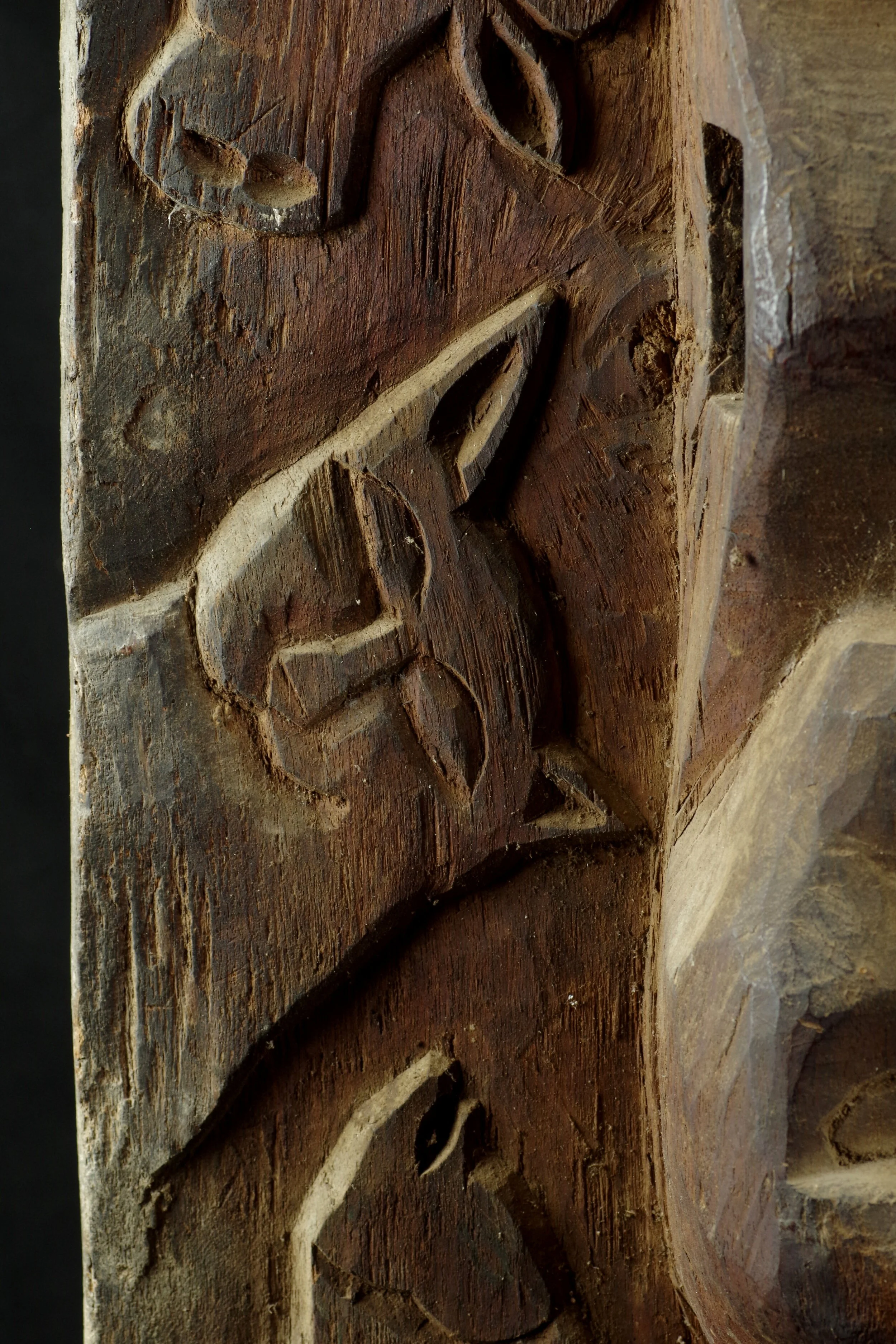 Tribal timor door with carved faces