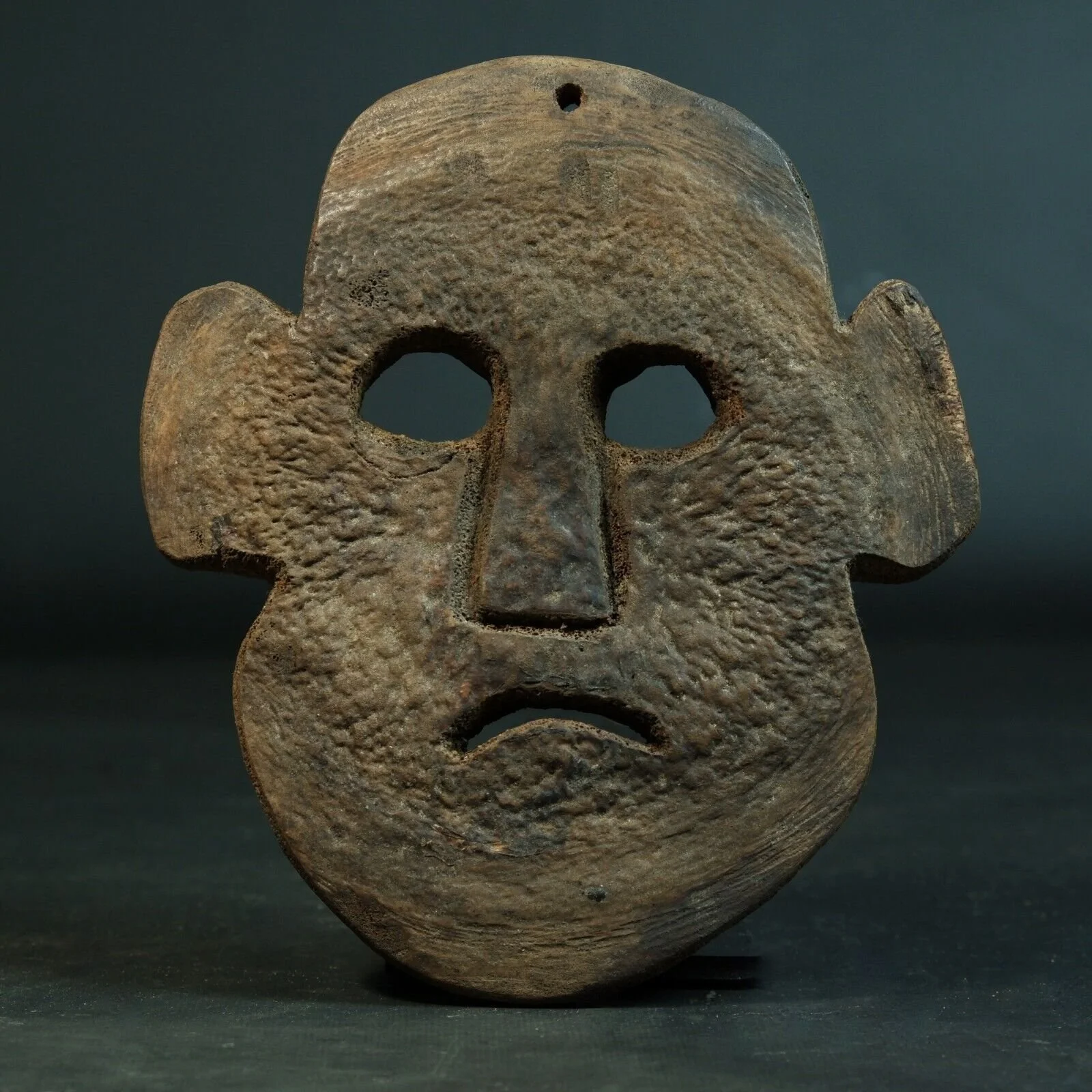 whale bone mask timor marine fossil.jpeg