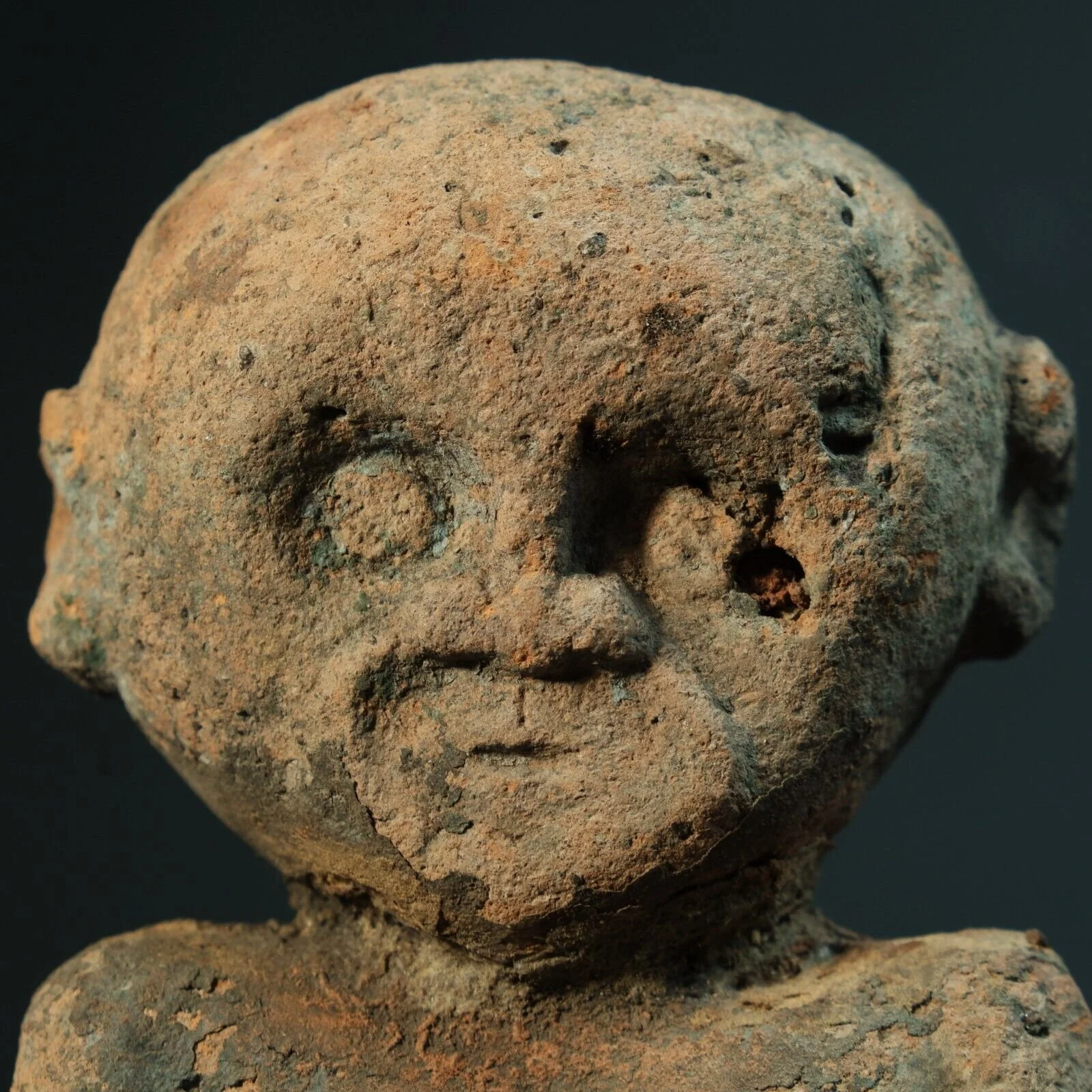 timor terracotta statuette male ancestor figure head.jpeg