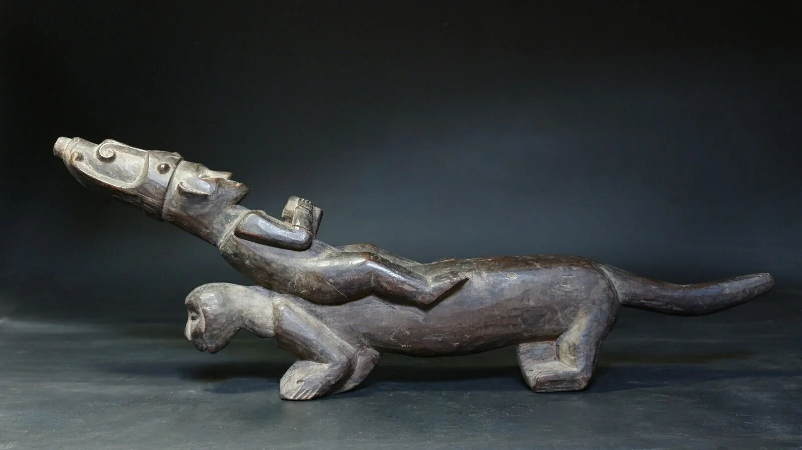 Antique Carved Nias Coconut Scraper Statue4.jpeg