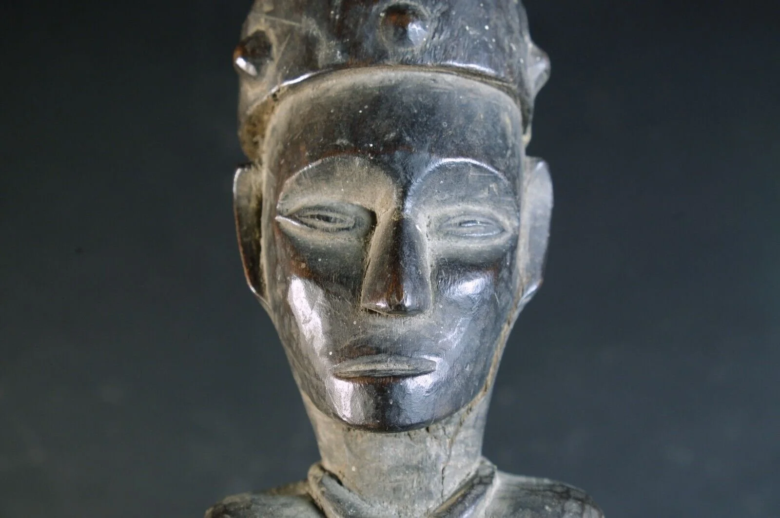 Antique Carved Nias Coconut Scraper Statues.jpeg