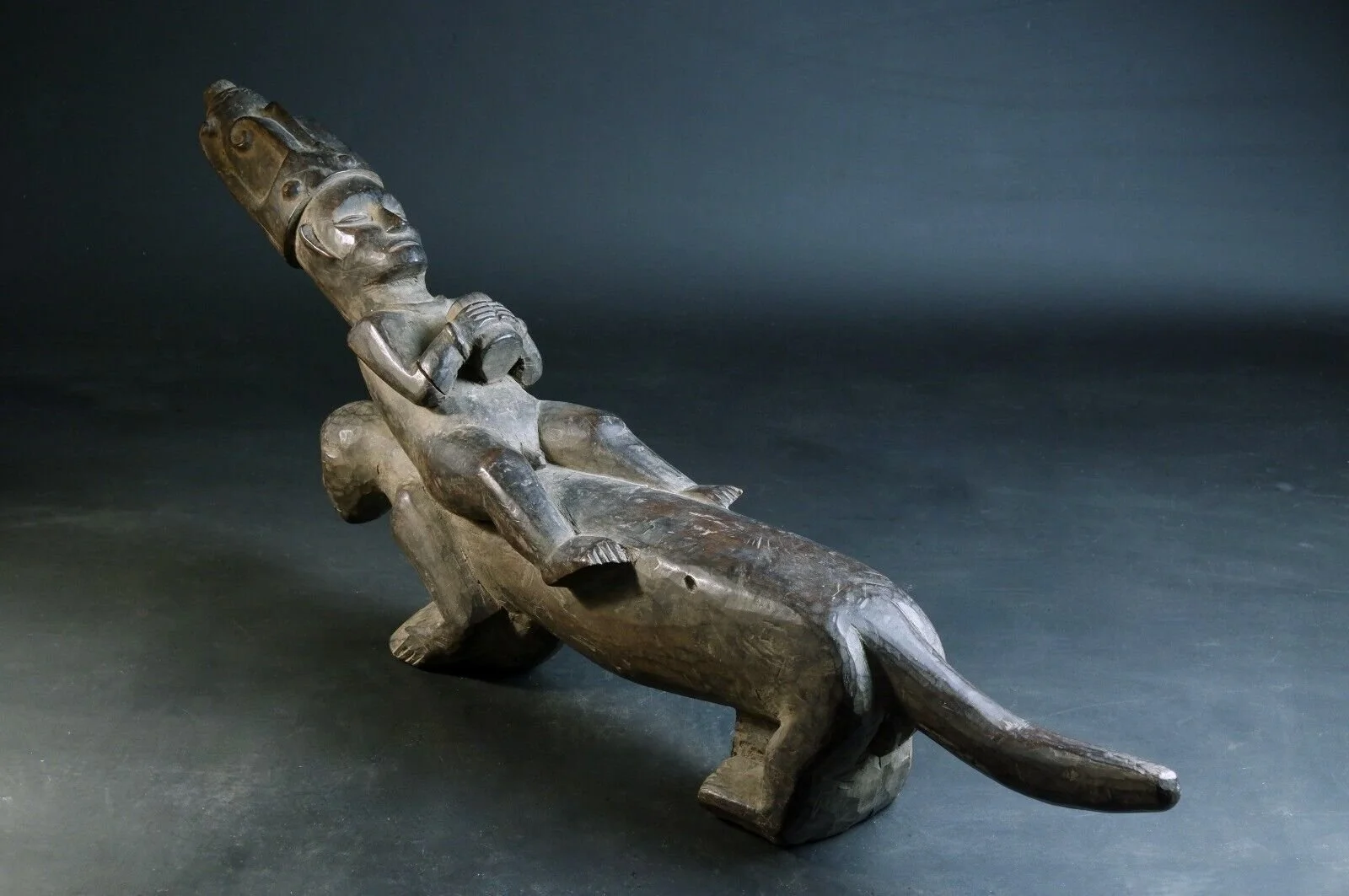 Antique Carved Nias Coconut Scraper Statue oceanic.jpeg