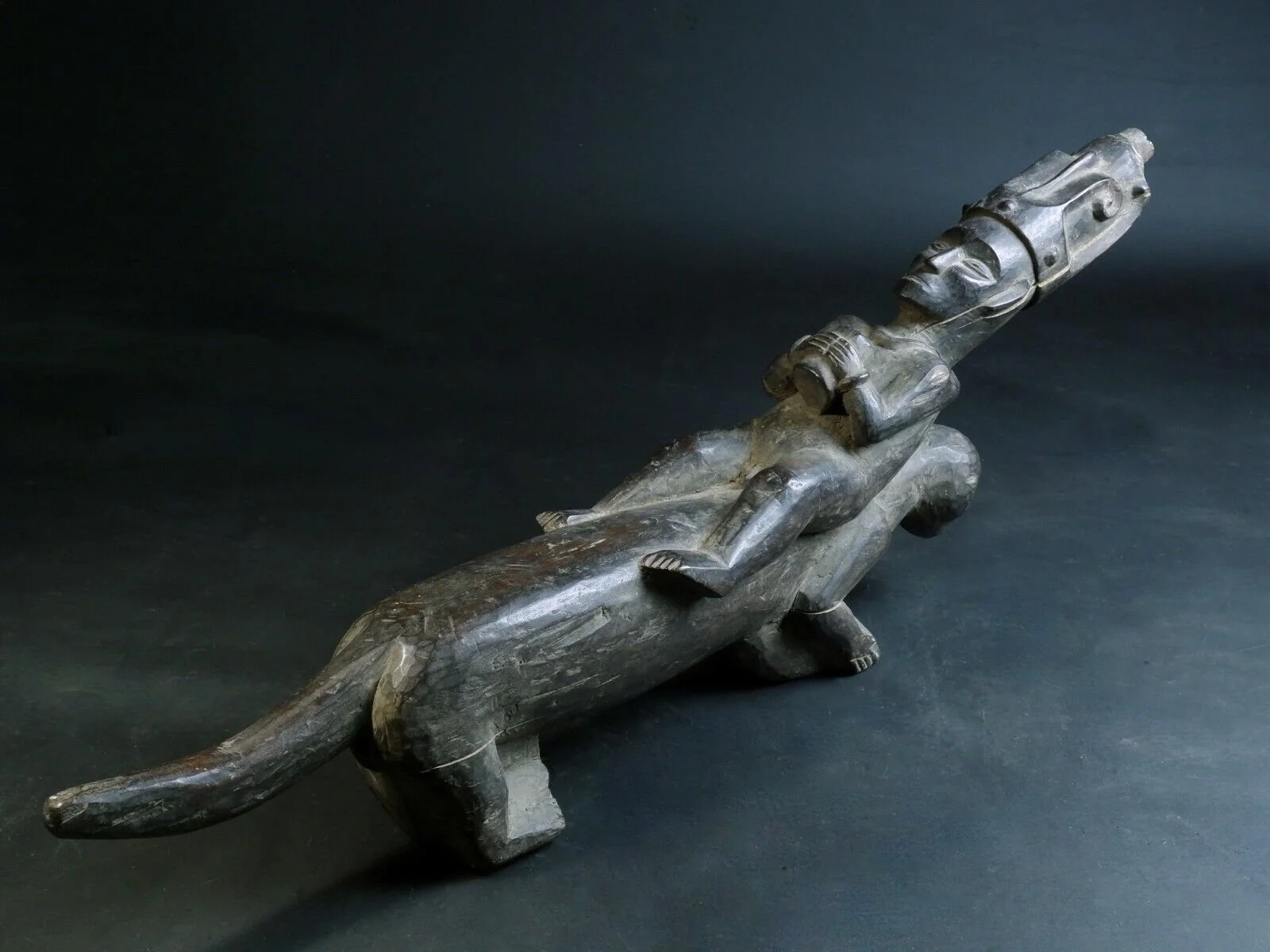 Antique Carved Nias Coconut Scraper Statue3.jpeg