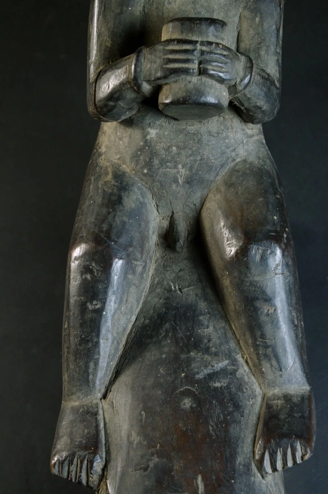 Antique Carved Nias Coconut Scraper Statuew.jpeg