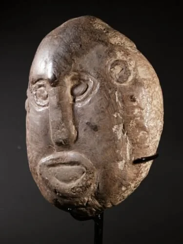 stone talisman mask timor indonesia2.jpeg