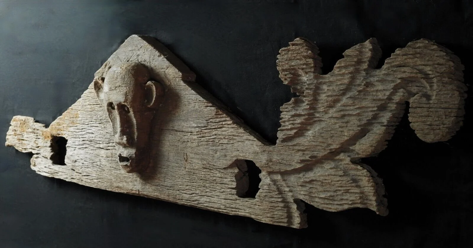 Dayak carved coffin wooden panel side.jpeg
