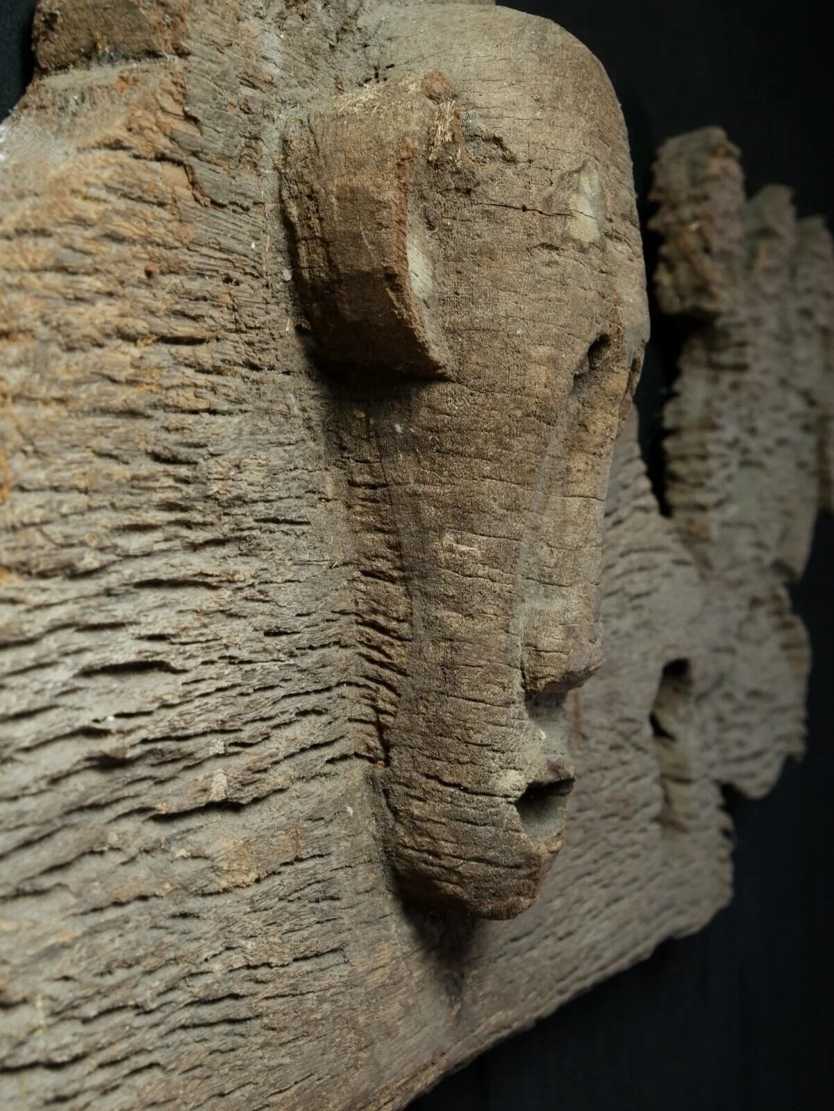 Dayak carved coffin wooden panel side left detail.jpeg