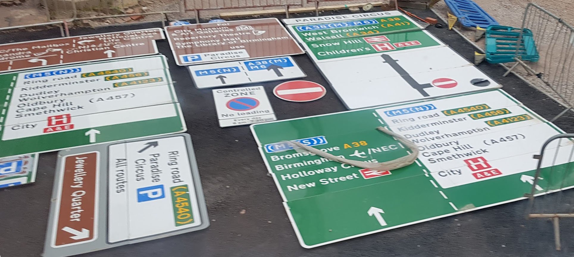 Pieces of roadside visual communication waiting to be installed