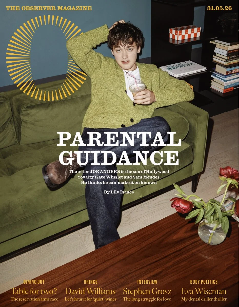 The cover of 'Parental Guidance' magazine featuring actor Joe Anderson sitting on a couch with a drink. The background includes a bookshelf, a plant with flowers, and a wall with magazine text.