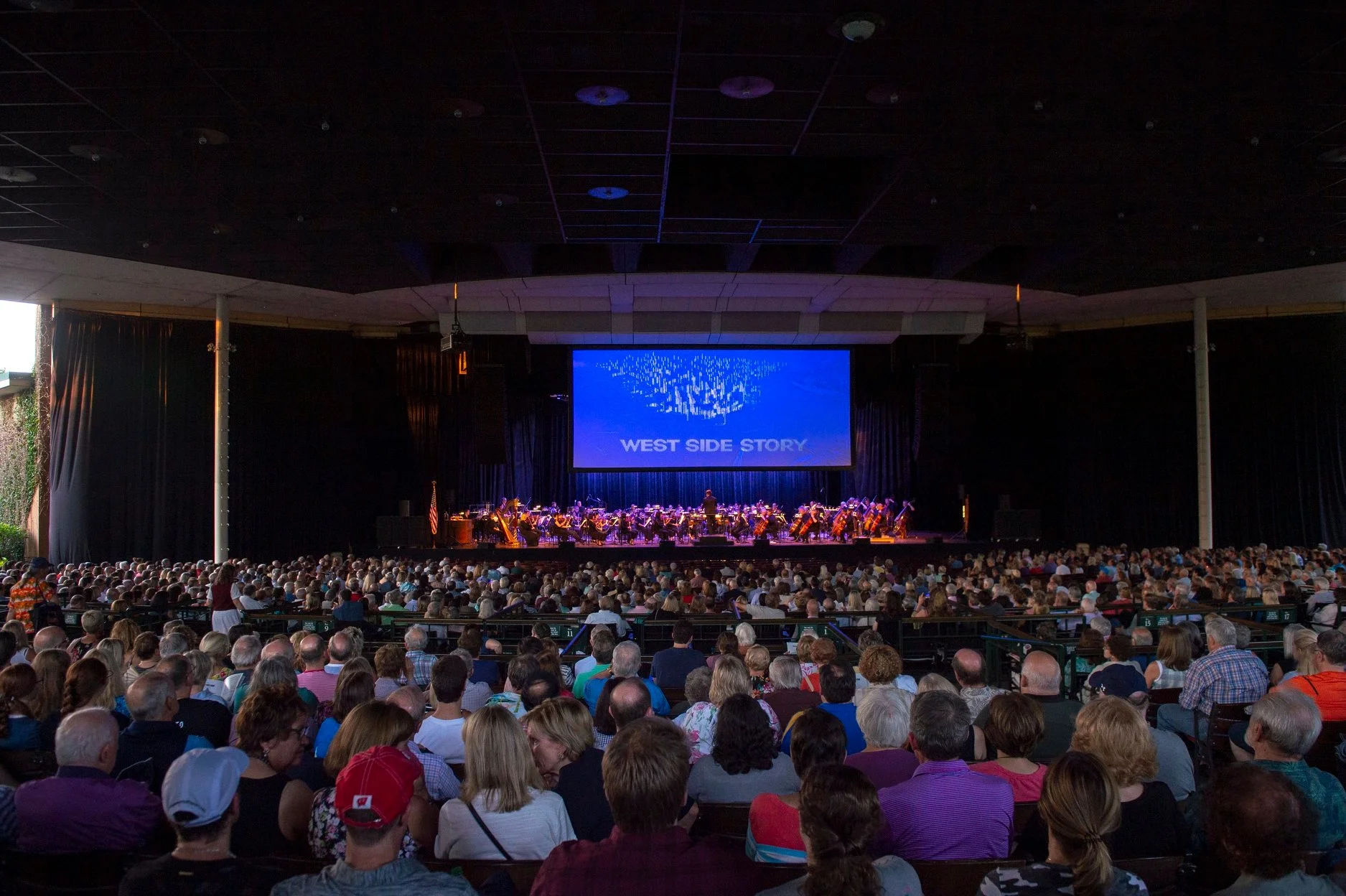 Conductor David Newman leading the Chicago Symphony Orchestra in West Side Story Film with Live Orchestra at the Ravinia Festival 2019. Photo courtesy of the Ravinia Festival.