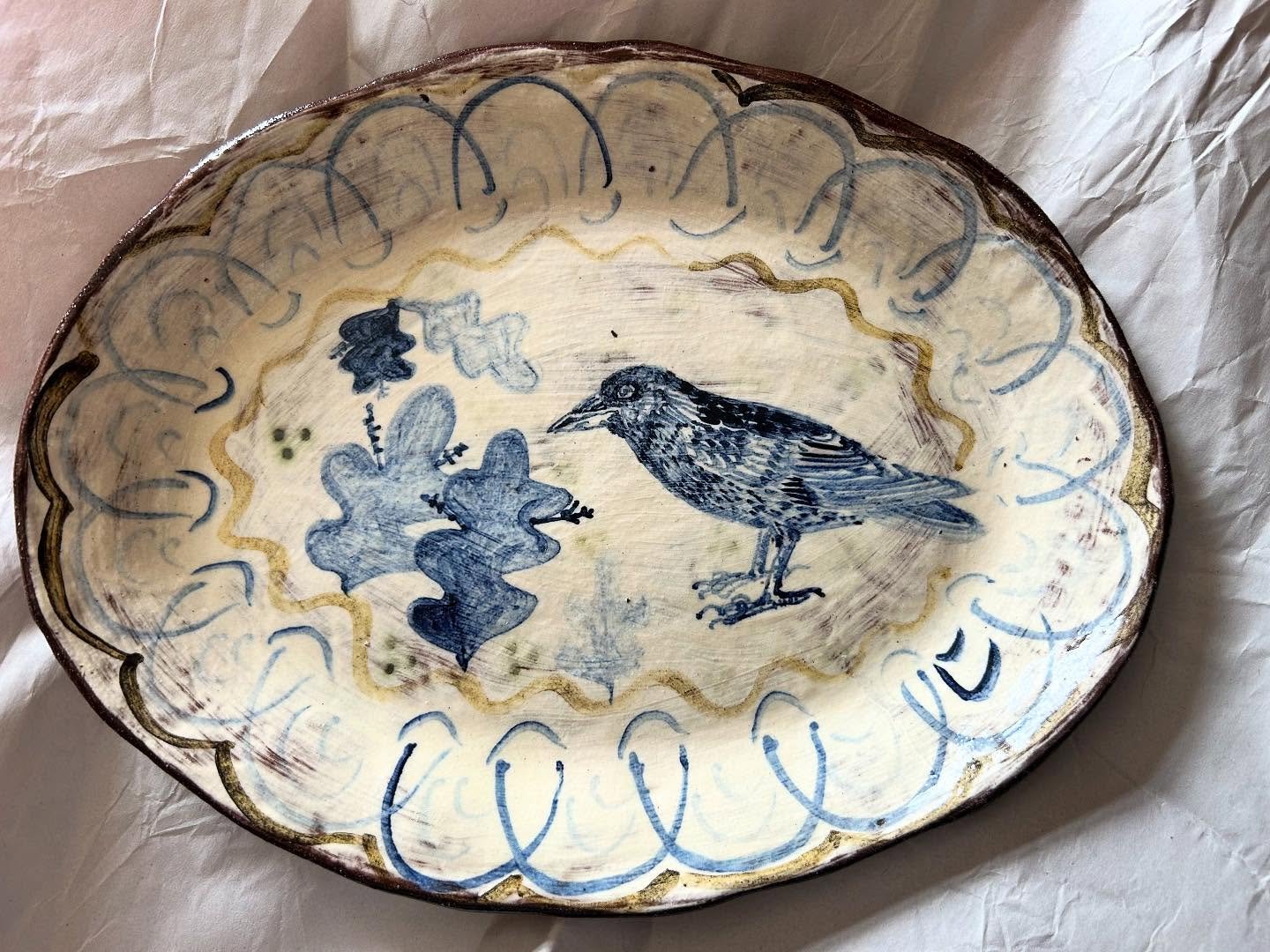 Raven on its way to Myriad in London, curated by the lovely mother and daughter team @curator_and_maker #plate #slipware #slipwarepottery #handmade #handpainted #inspiredbynature #inspiredbybirds #madeinpembrokeshire #madeinwales #adriftpottery #rav