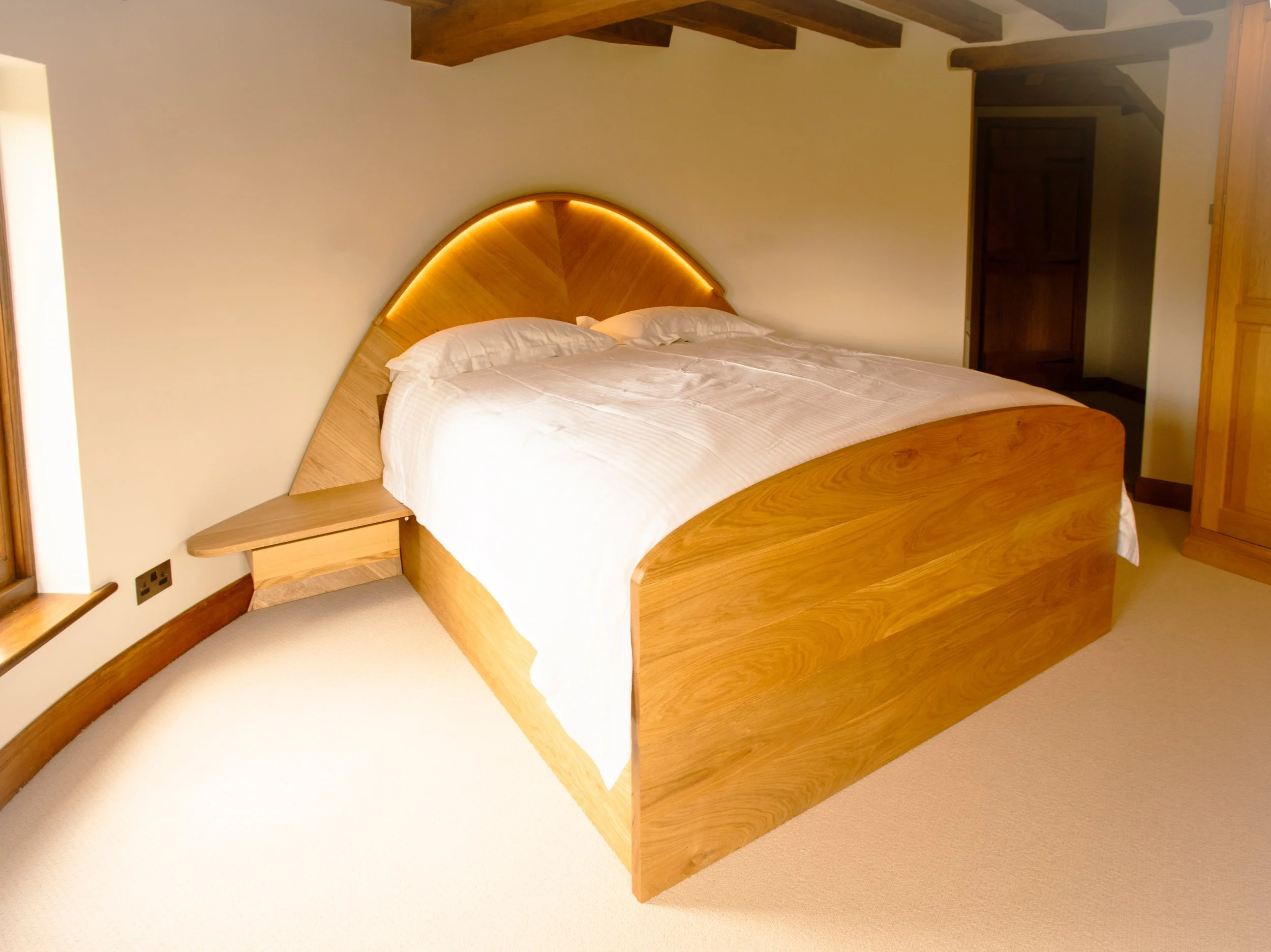 Bespoke Solid Oak Bed and Side Tables For A Circular Bedroom