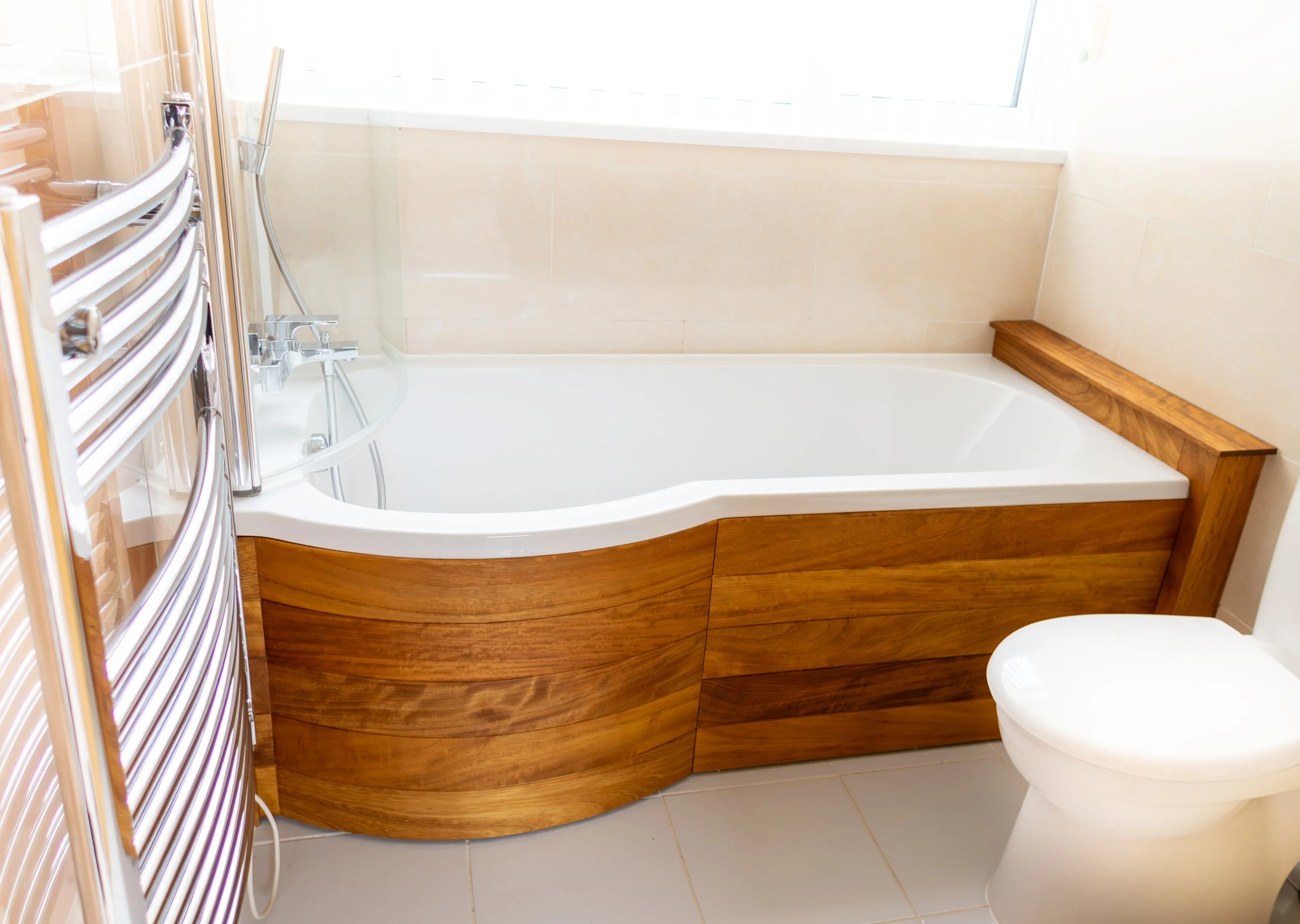 Curved Bath Panel and Trim in Soild, Oiled Iroko
