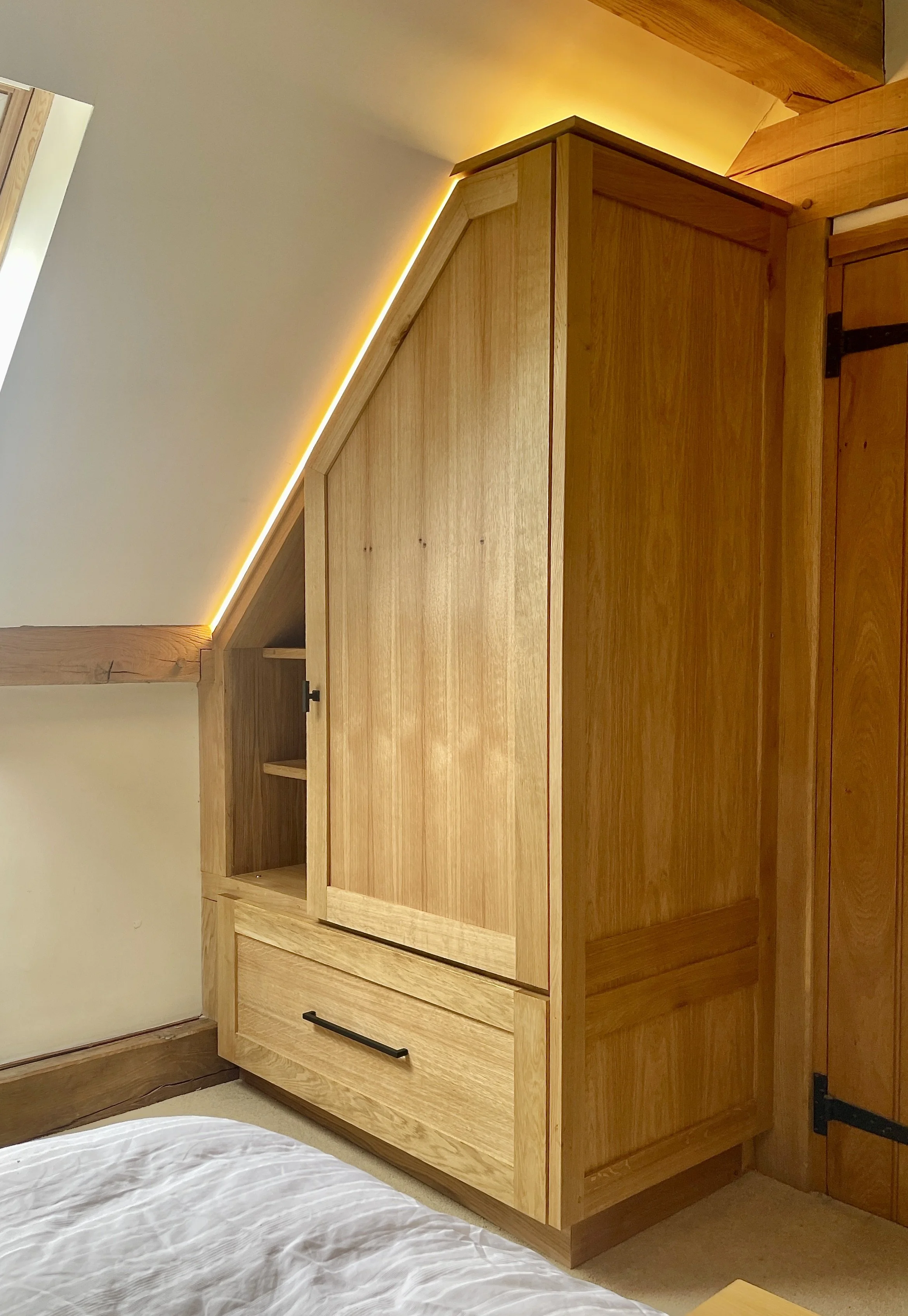 solid-oak-clothes-cupboard-24v-led-lighting-under-eaves.jpg
