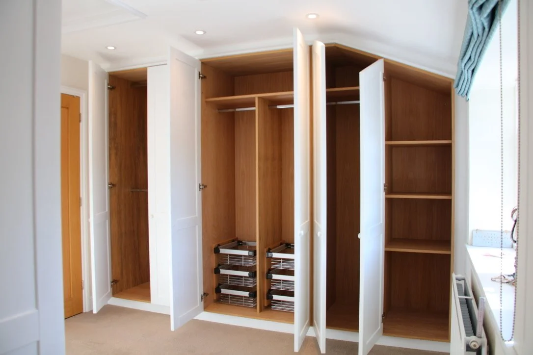oiled-oak-wardrobe-painted-doors-pull-out-baskets.jpg