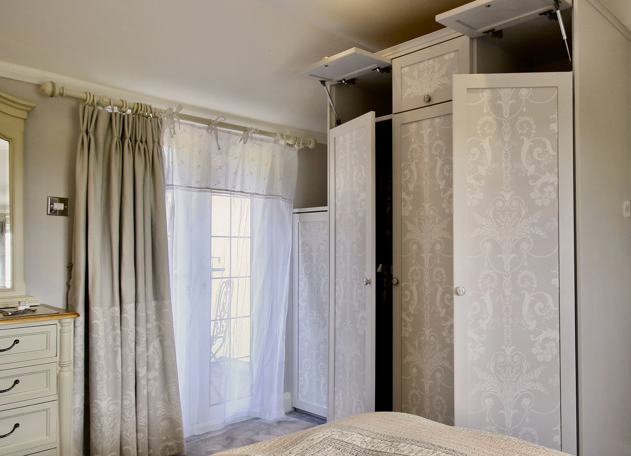wardrobe-with-wallpapered-panel-doors.jpg
