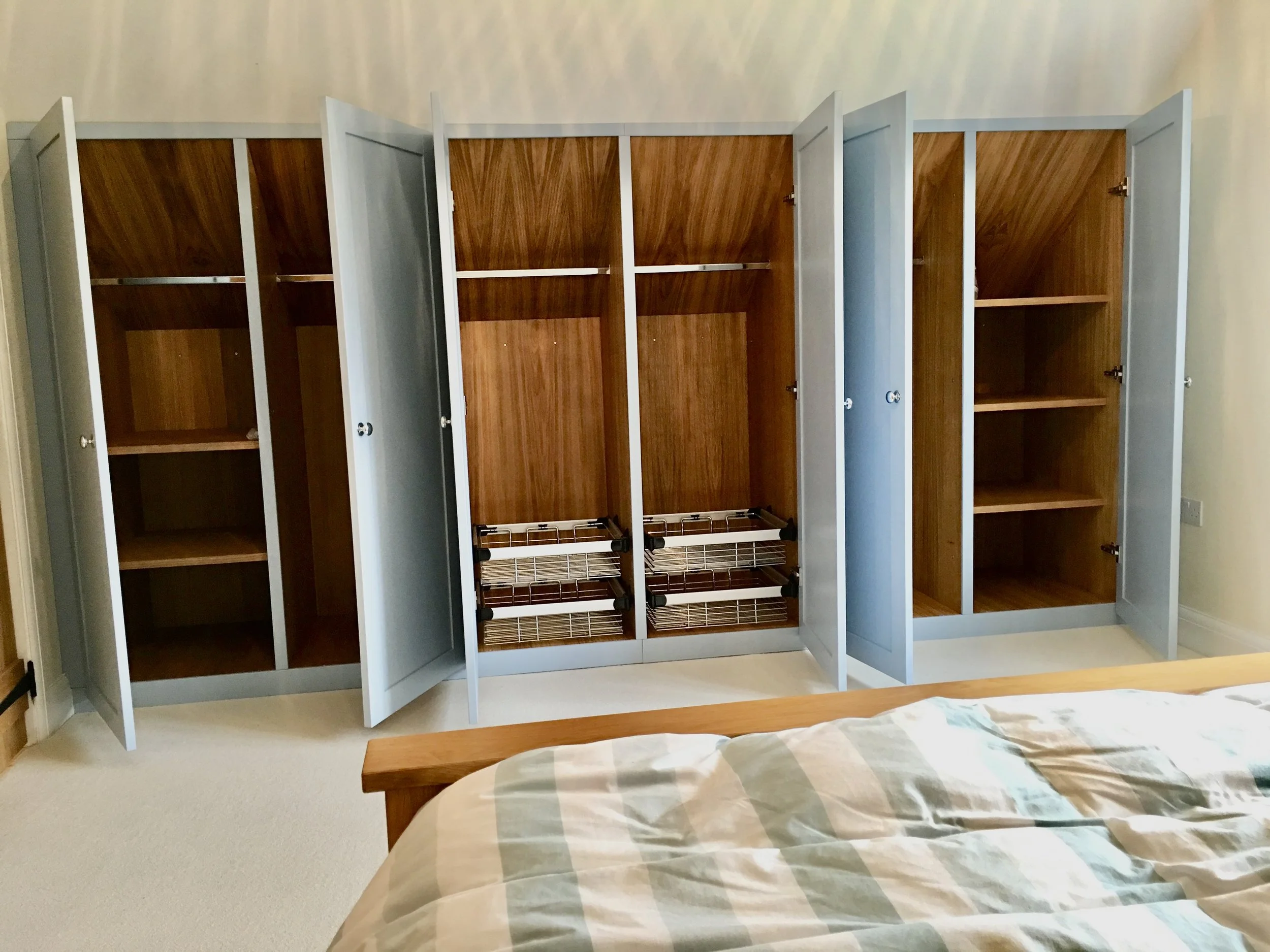 painted-wardrobe-oiled-oak-interior-pull-out-baskets.jpg