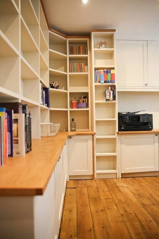 photographers-studio-wall-fitted-cupboards-book-wall-and-desks.jpg