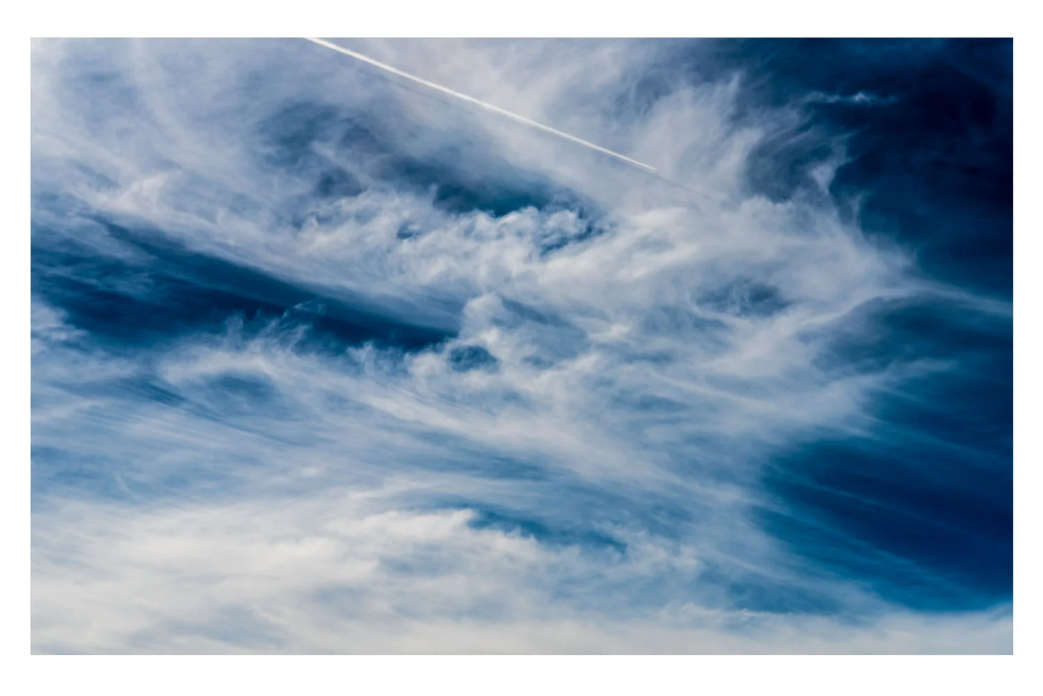 jetting through a midmorning cloudscape.jpg