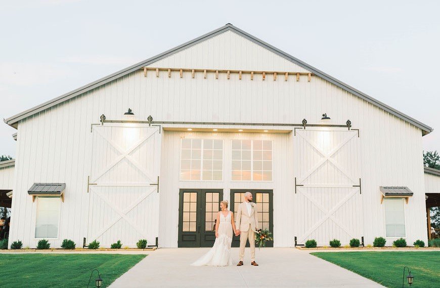 bride-groom-white-barn-venue.jpeg