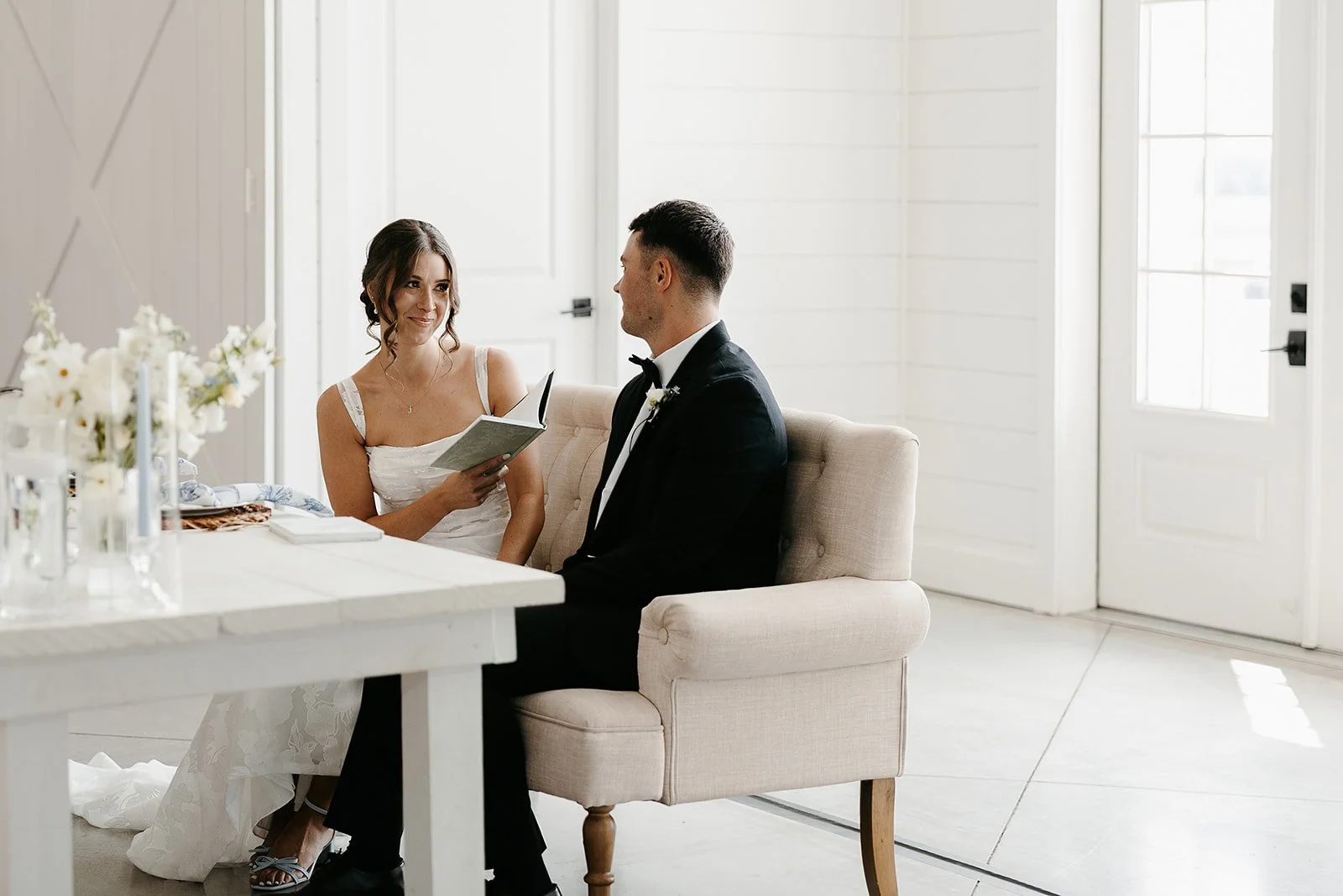 bride and groom at The Barn at Grace Hill sharing private vows