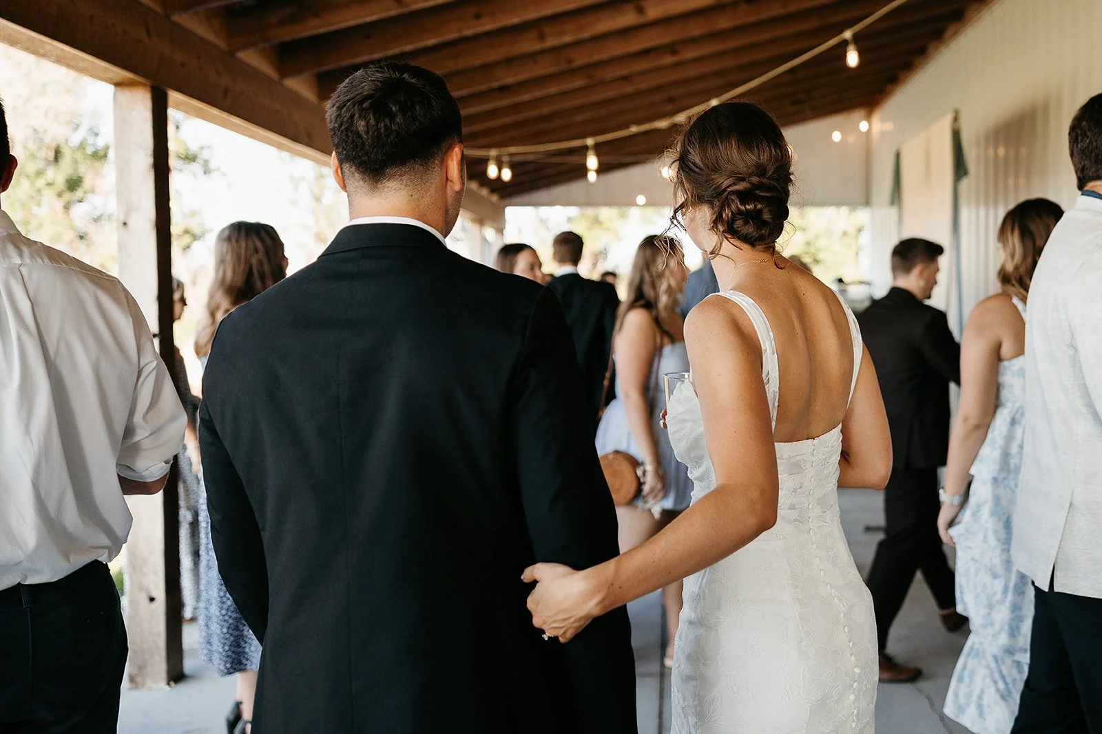 cocktail hour with bride and groom at wedding venue wichita kansas