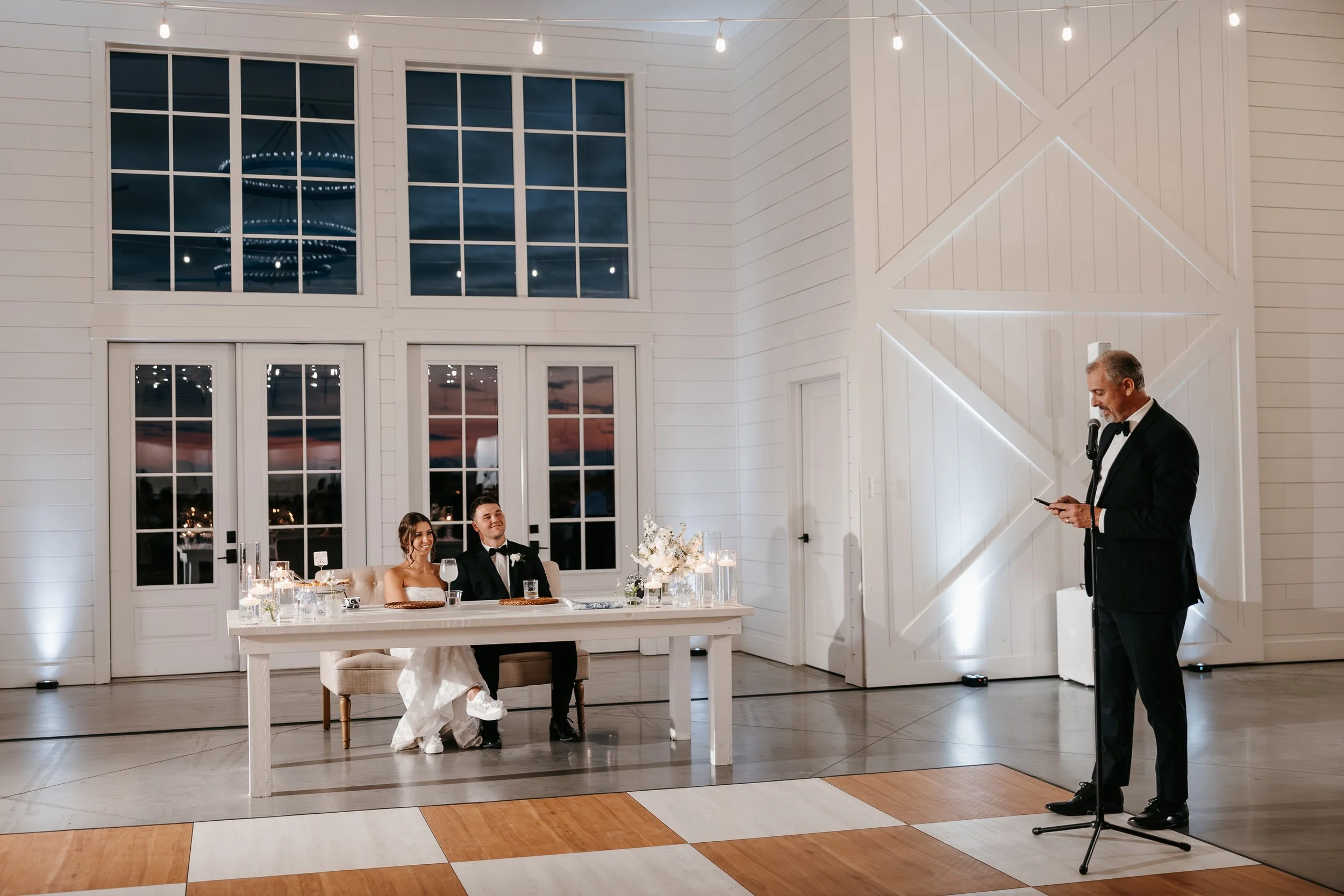 bride's dad giving a toast during reception at wedding venue near wichita