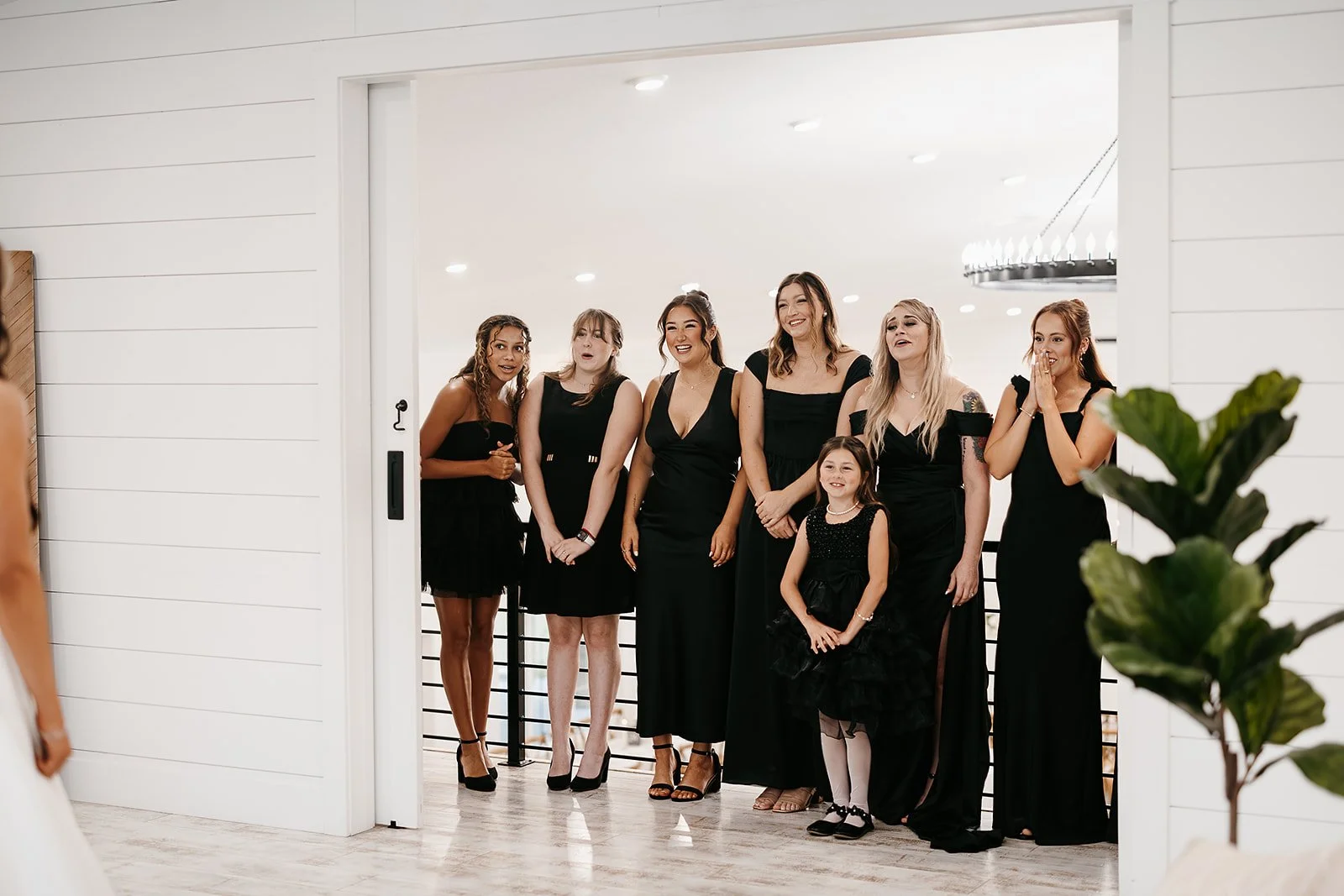 bridesmaids getting a first look at the bride