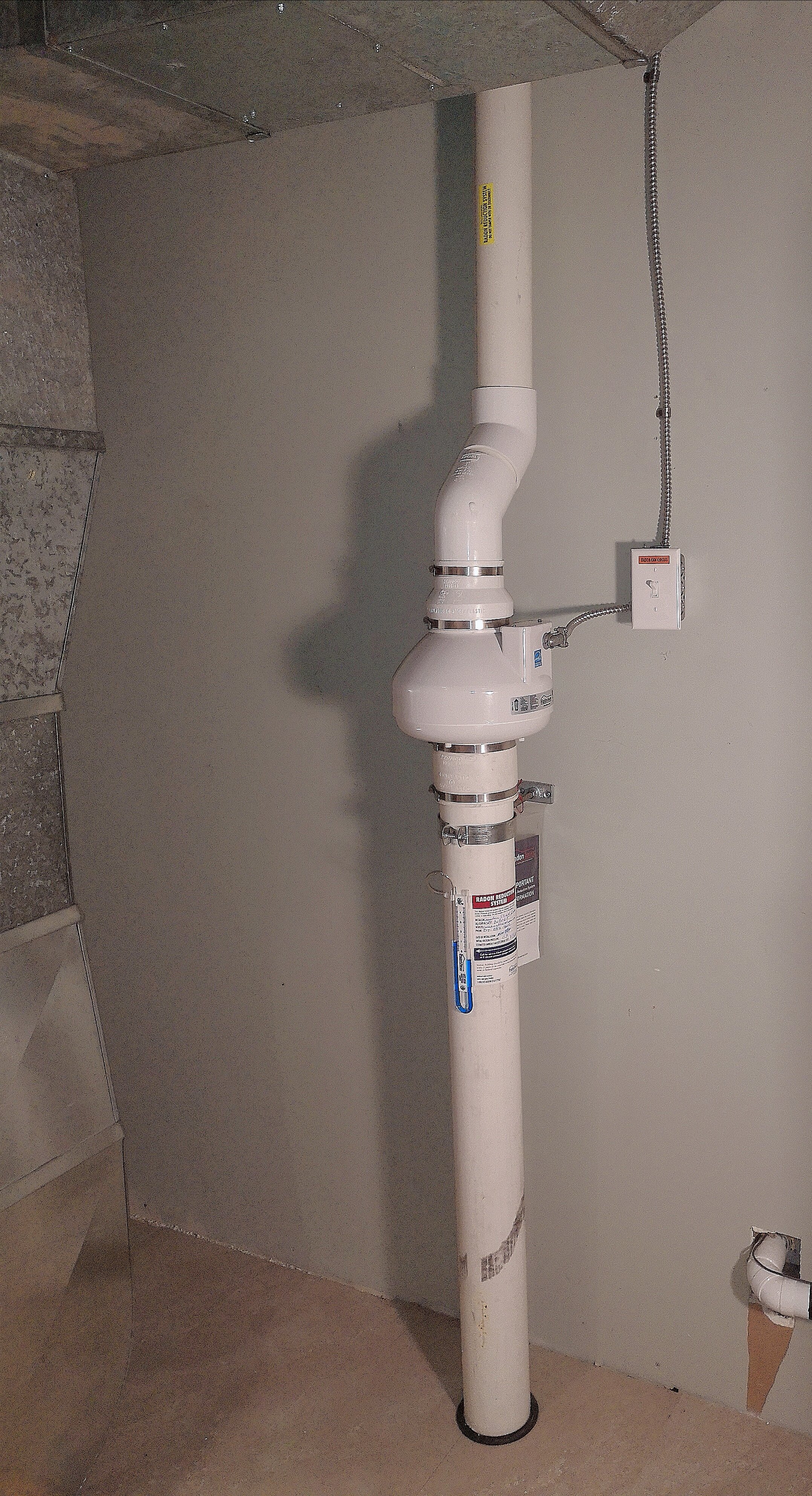 radon mitigation fan installation.jpg