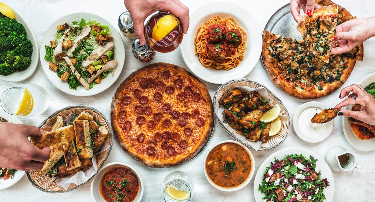 amicis-east-coast-pizzeria-food-spread.jpg