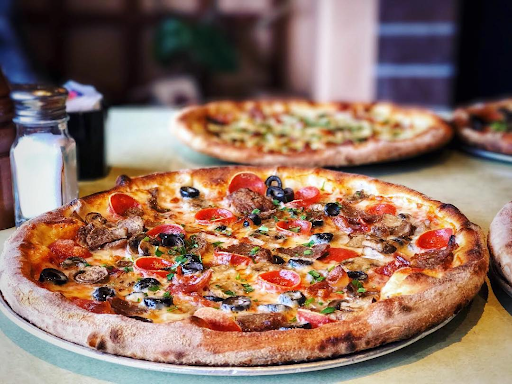 What Makes Pizza Timeless in a City That’s Always Changing?