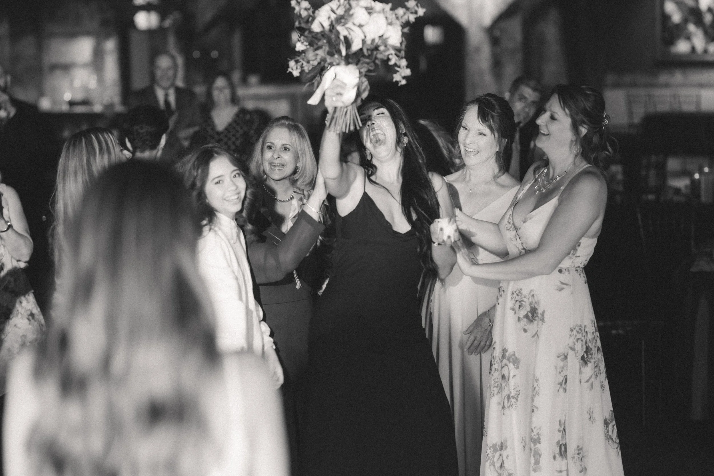 Omaha Wedding Photographer | Bouquet Toss | Fun Reception Shots 