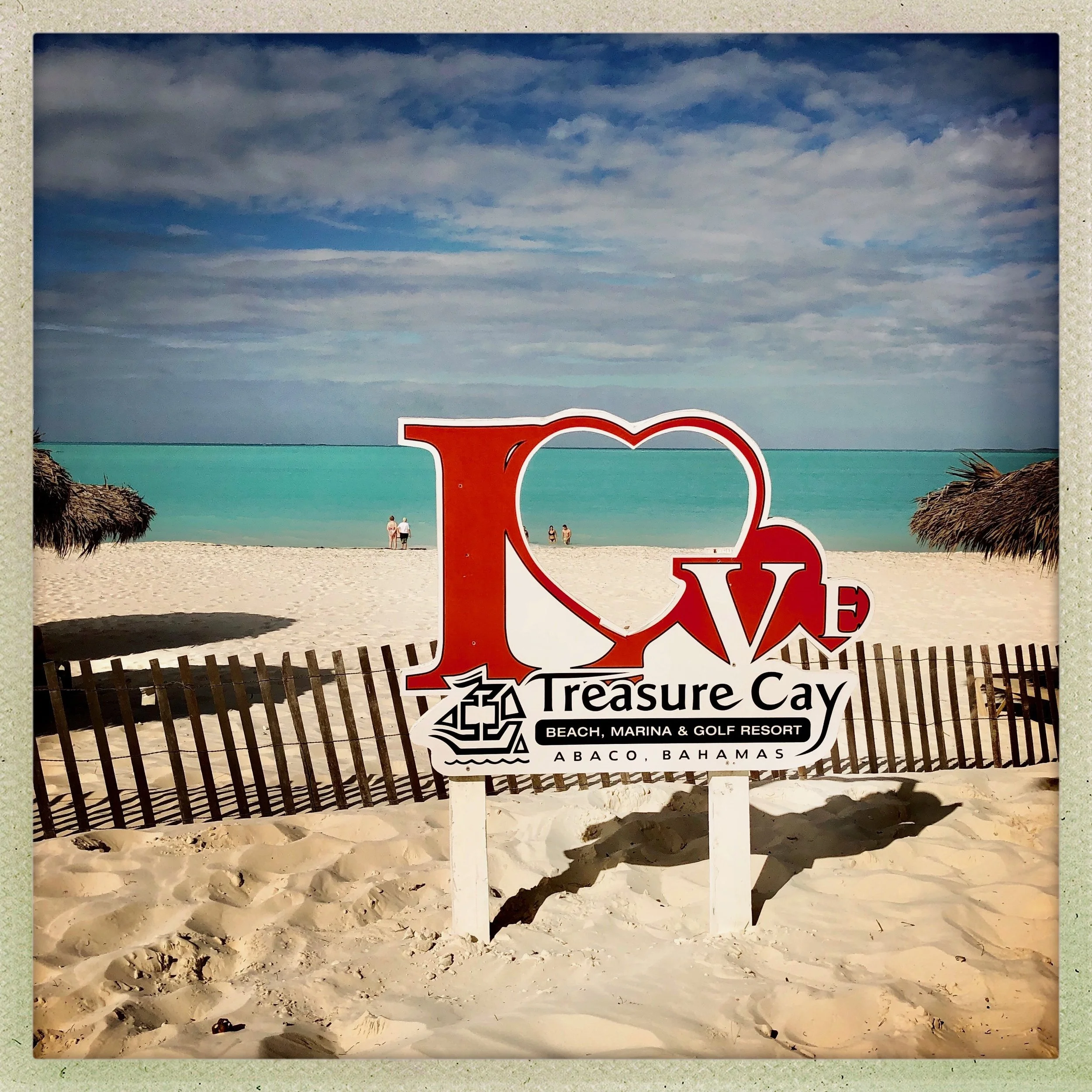 Open Air Places Treasure Cay Beach Sign.jpg